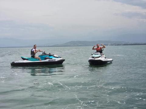 Friends jet-skiing in Lake Illawarra with Illawarra Jet Ski Tours