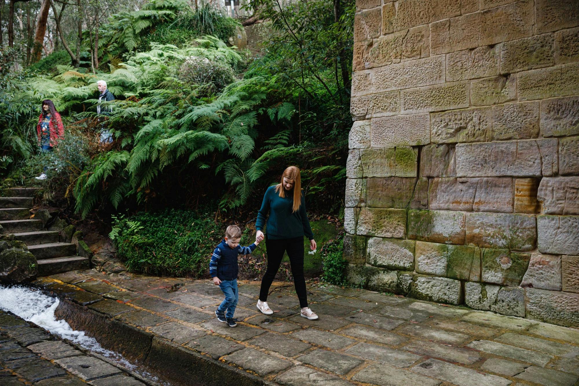 Family Walking through the Lennox Bridge