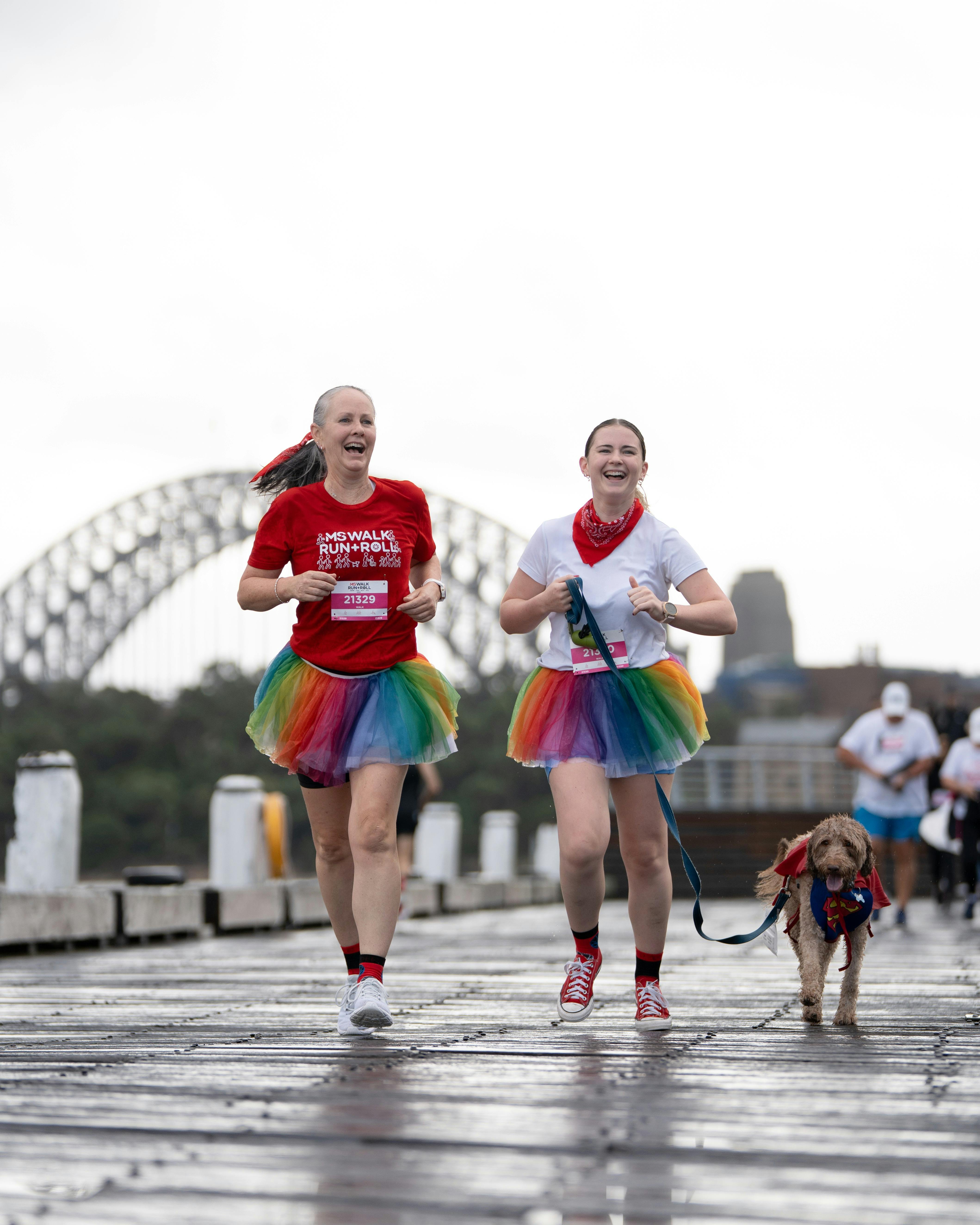 2 Runners in tutus in front of the Sydney Harbour Bridge