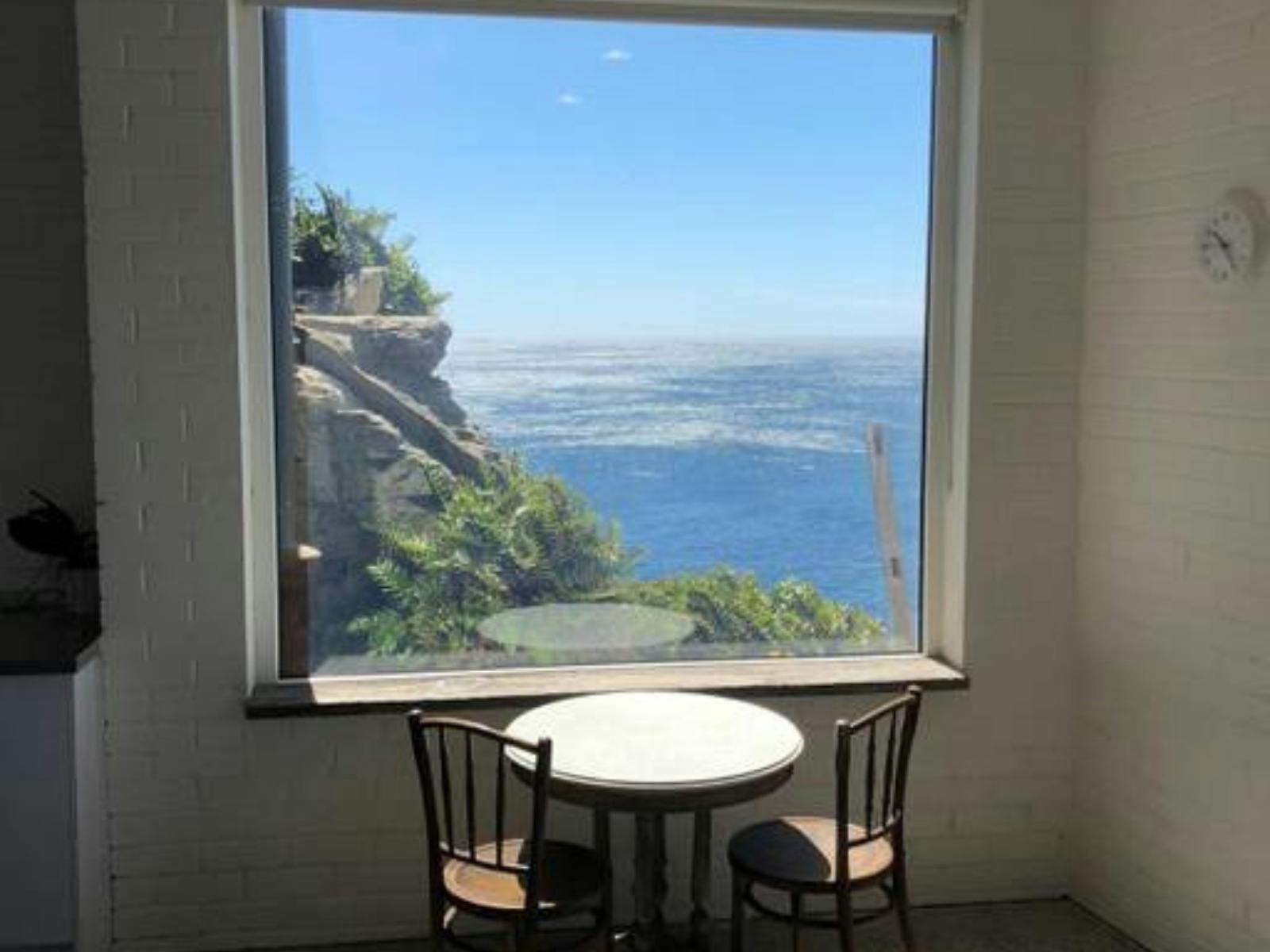 Stunning coastal views from this cliffside property, where the ocean meets your doorstep.
