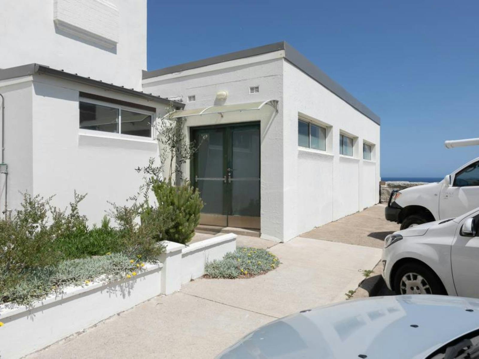 Stunning coastal views from this cliffside property, where the ocean meets your doorstep.