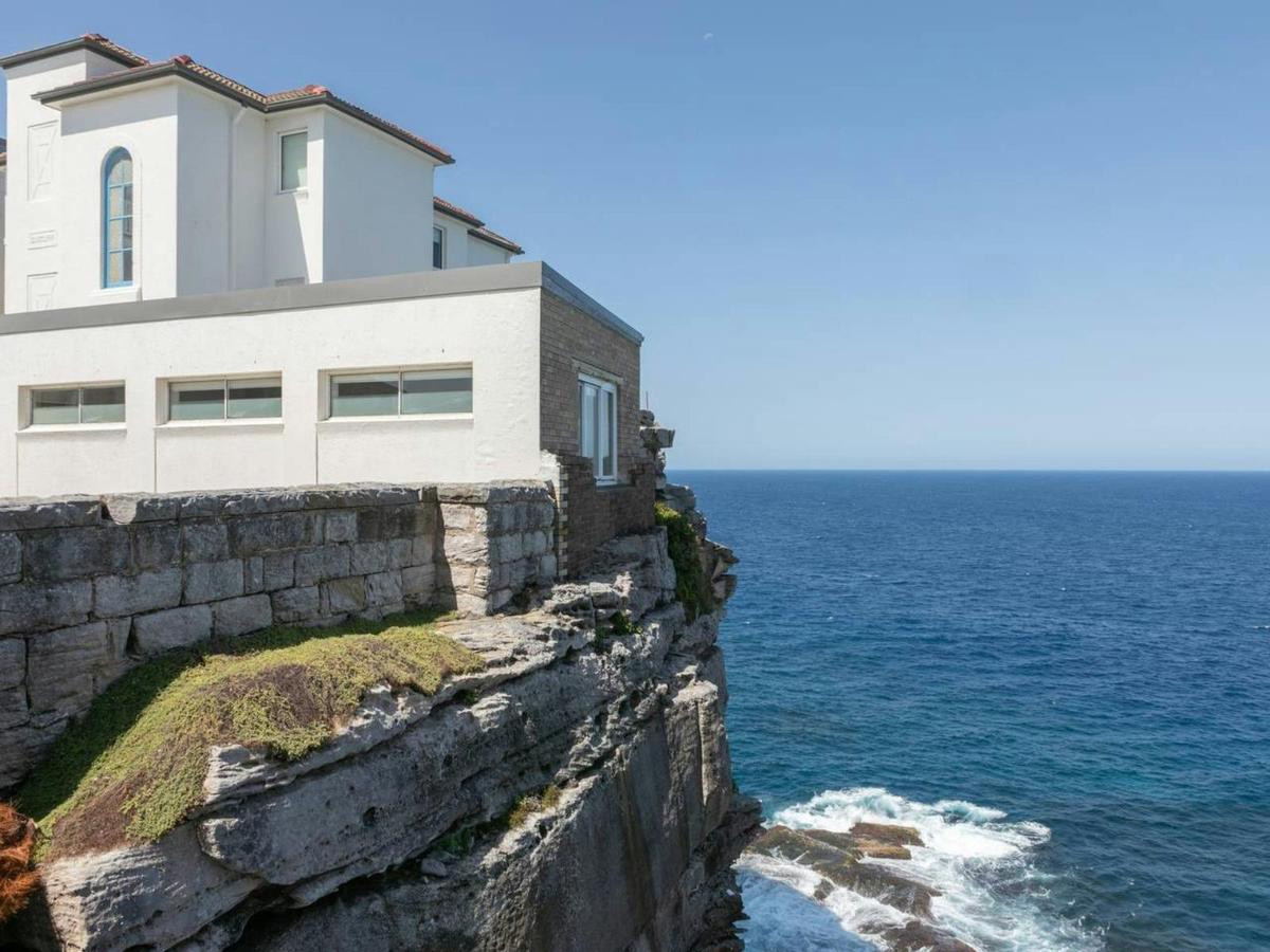 Stunning coastal views from this cliffside property, where the ocean meets your doorstep.