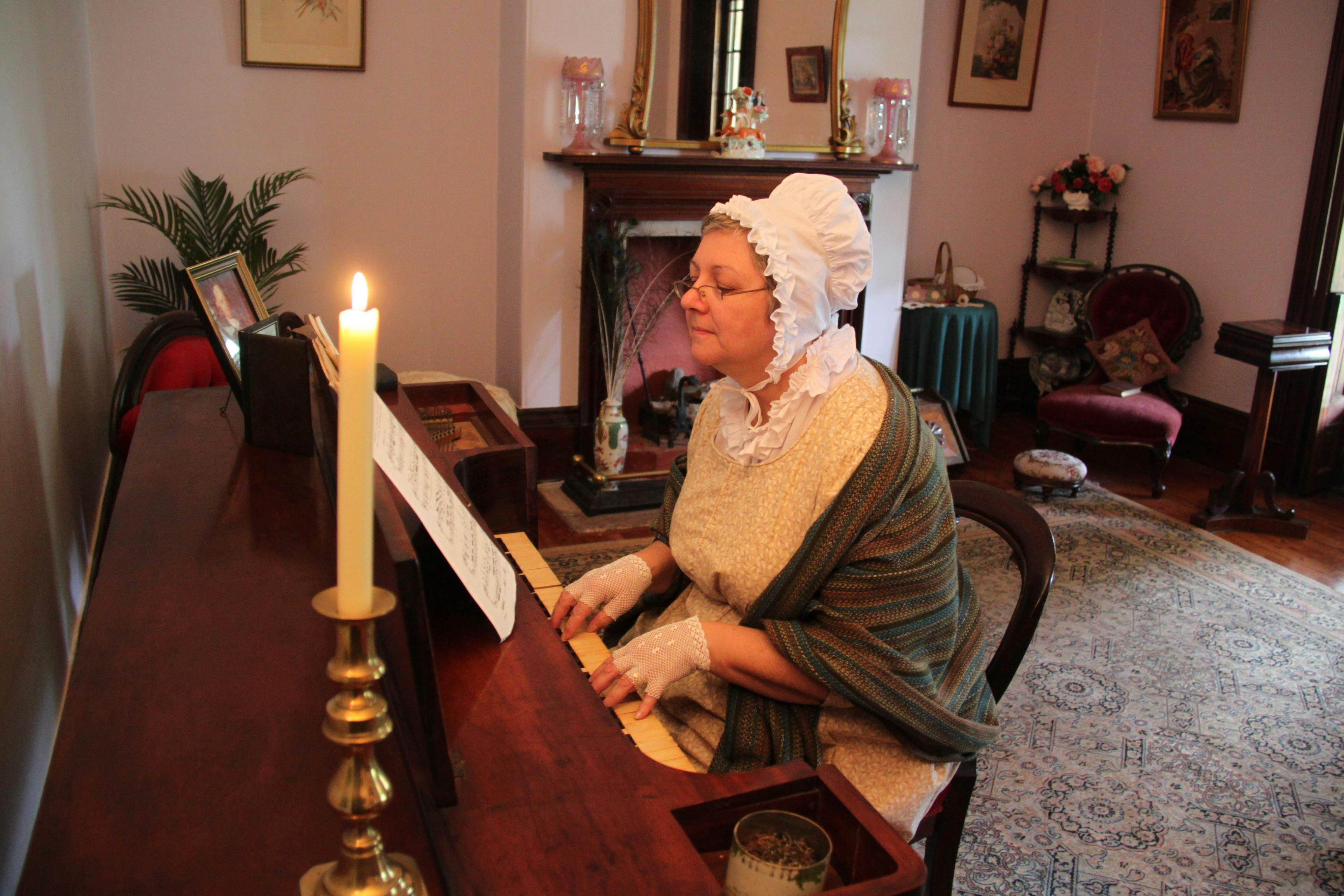 Guide playing Broadwood piano