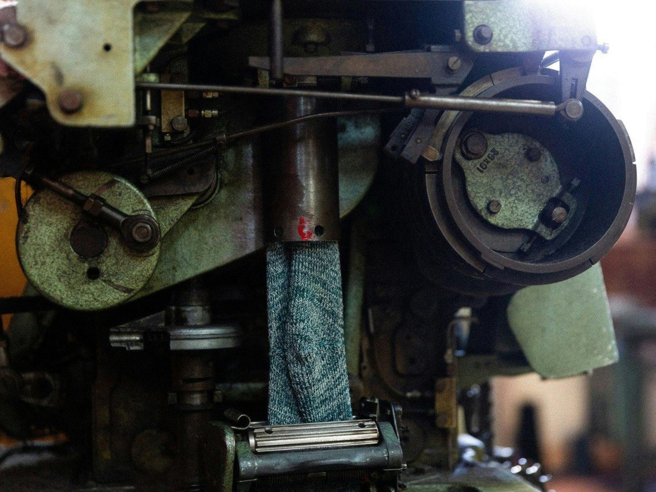 One of the vintage machines in action at the Lindner Socks Factory.