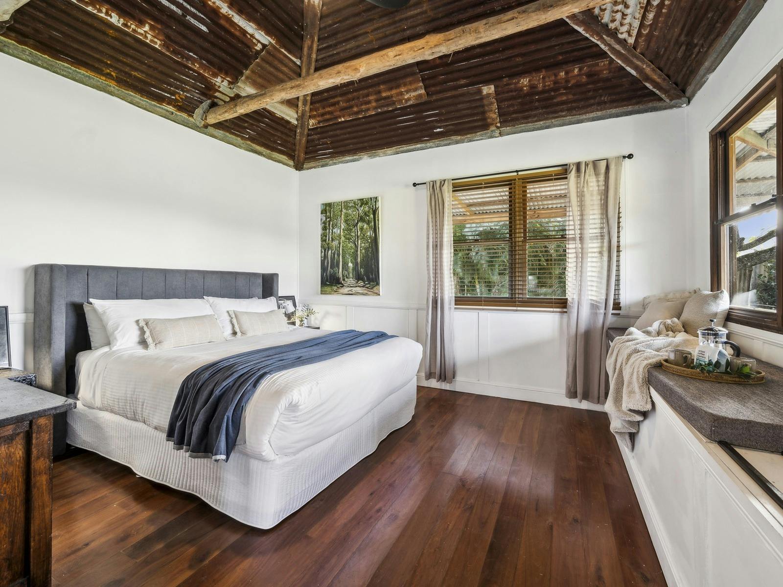 King bedroom at The Hitching Rail Hut near Coramba NSW, close to Coffs Harbour