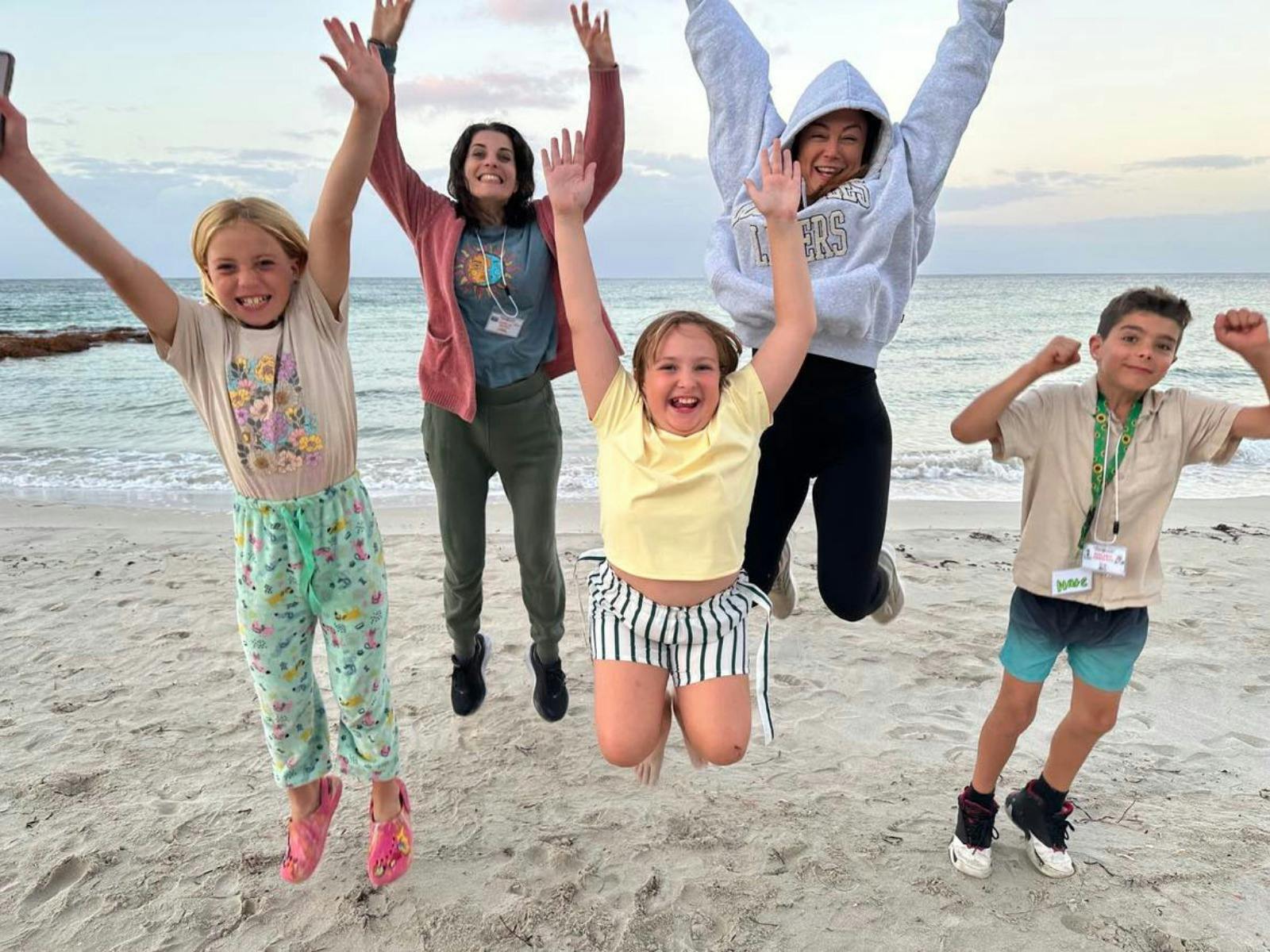 Access Adventure Club participants having fun at the beach
