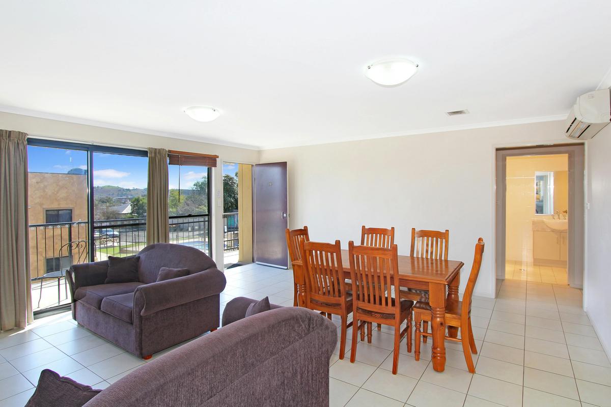 Lounge_Dining area with view of our pool