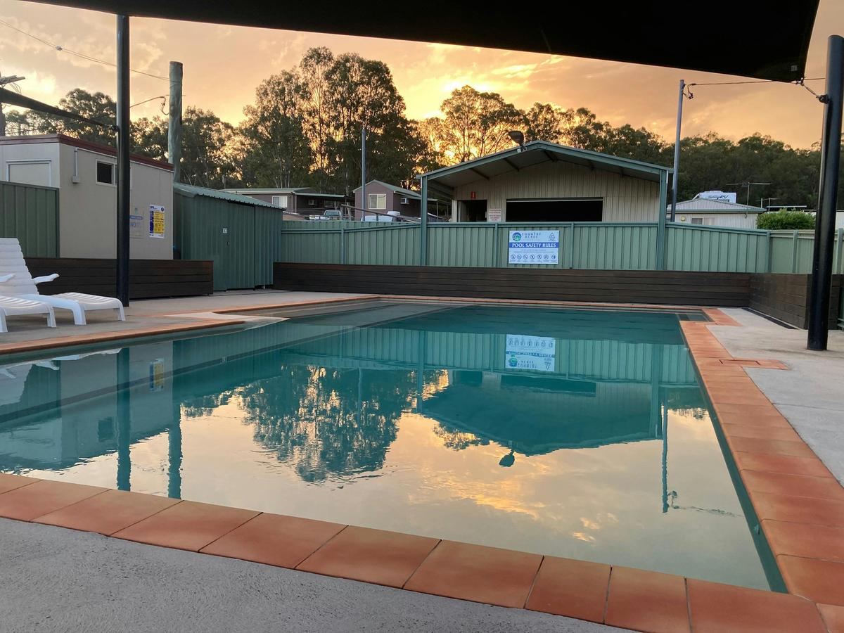 Sparkling saltwater pool at sunset