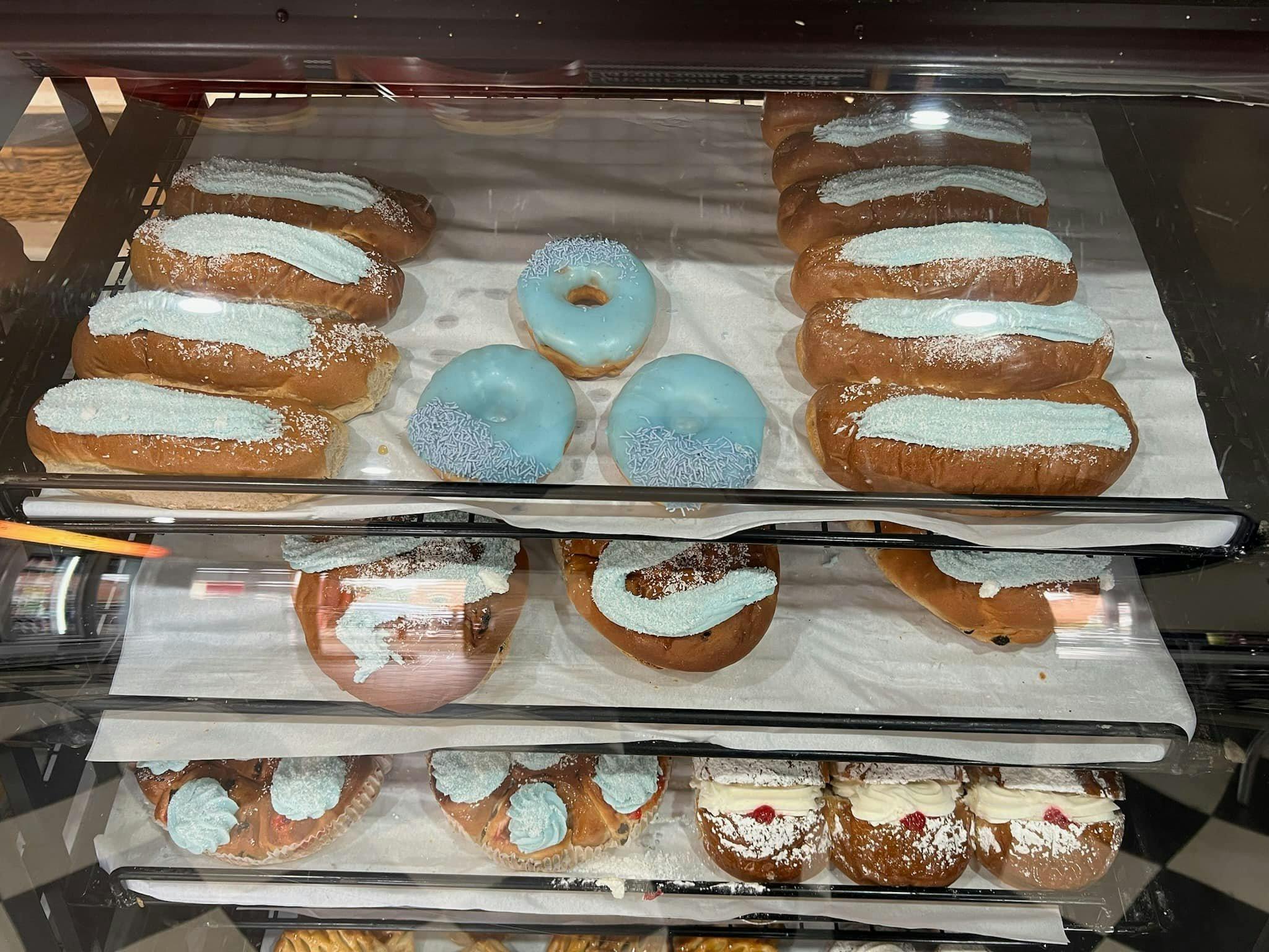 Donuts, Finger buns and Cup Cakes with baby blue icing