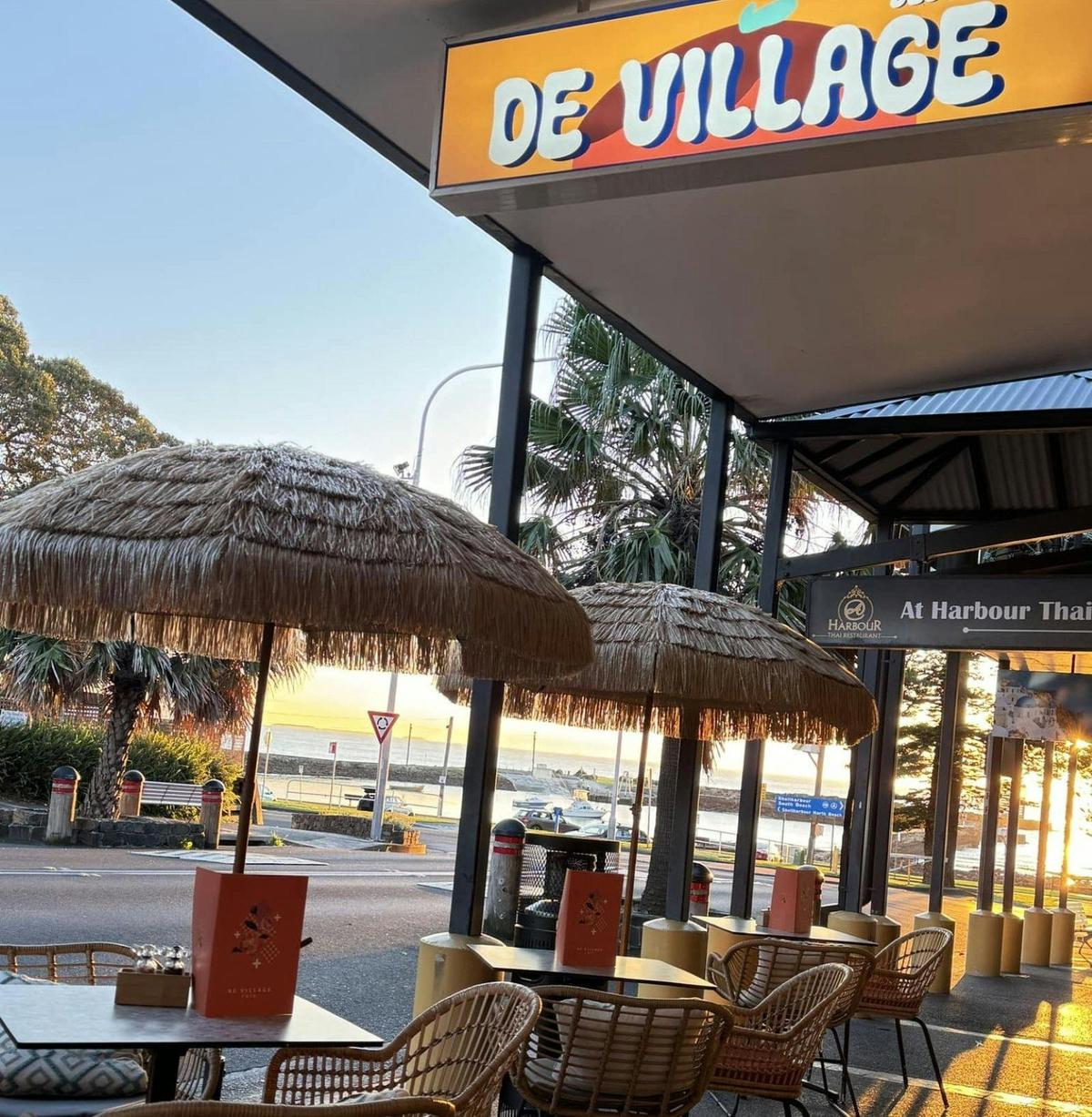 Outside De Village Cafe with Shellharbour harbour in background.