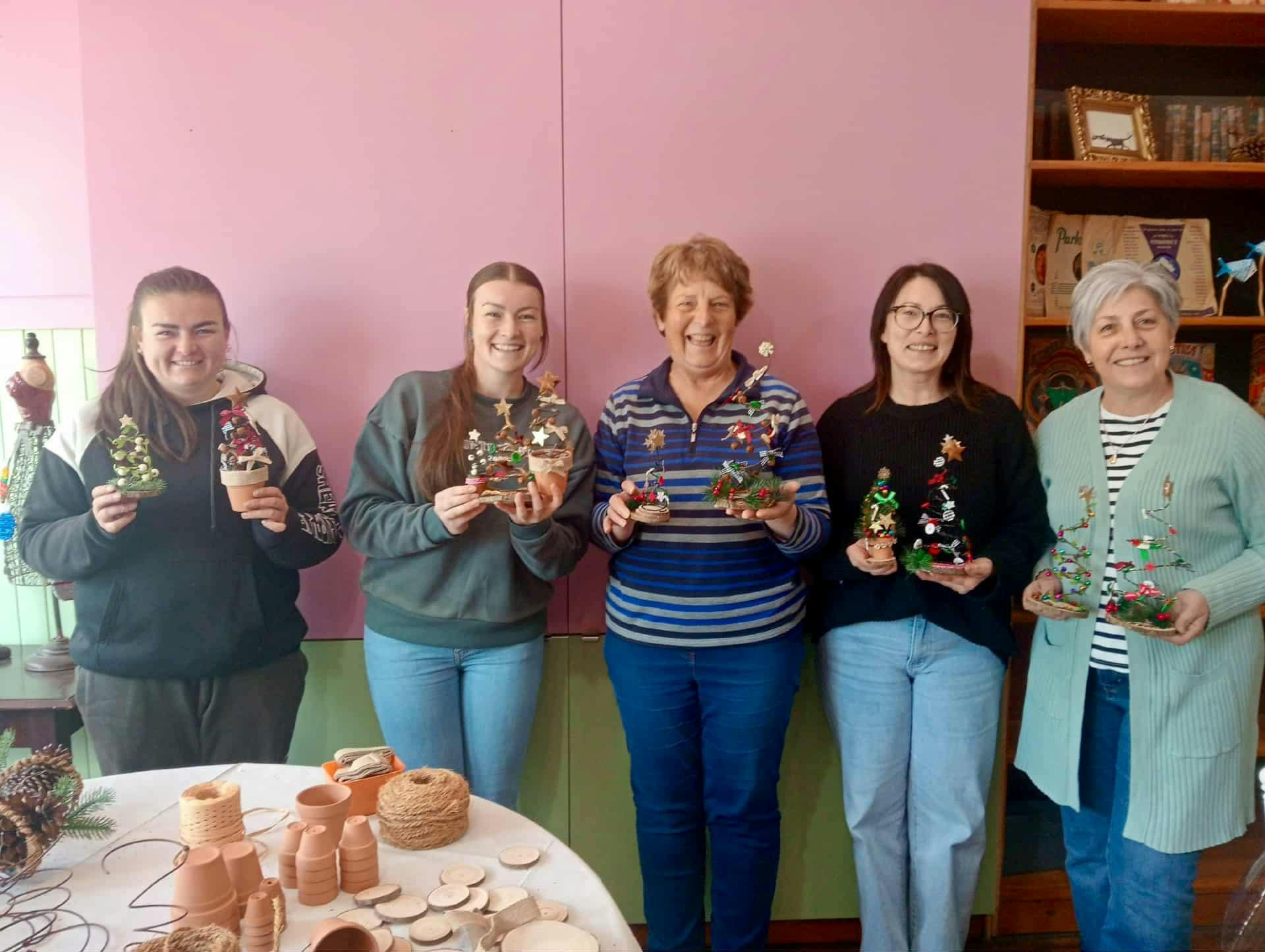 Guests finished creations after a Christmas get together to make Christmas Wire Tree decorations