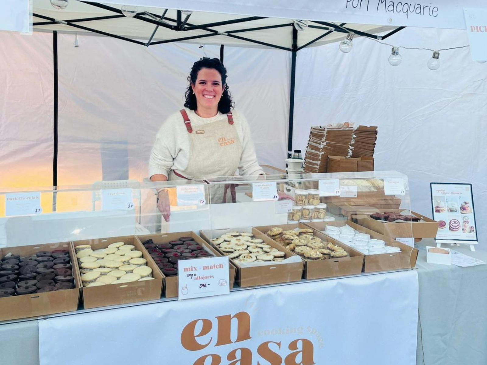 paula at an en casa cooking space market stall