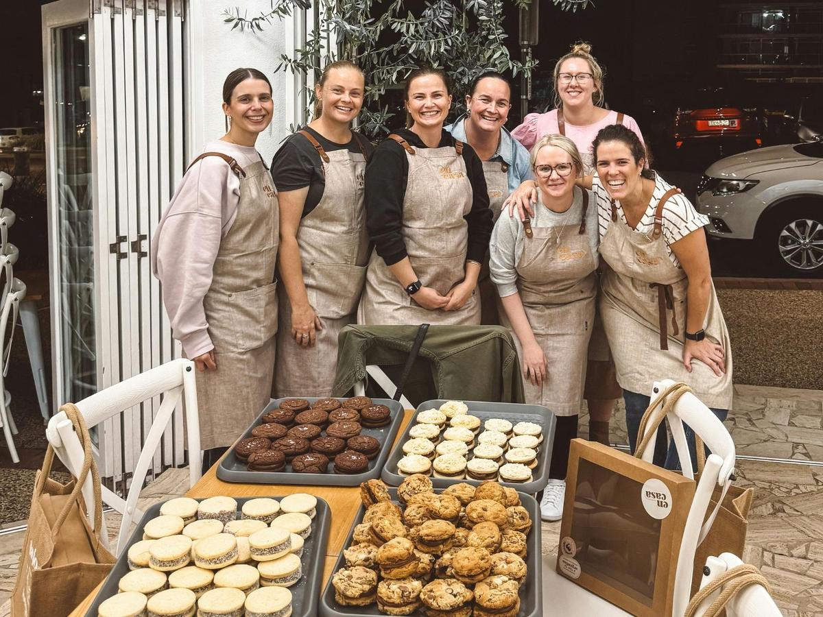 group of hobby bakers at an alfajores baking workshop