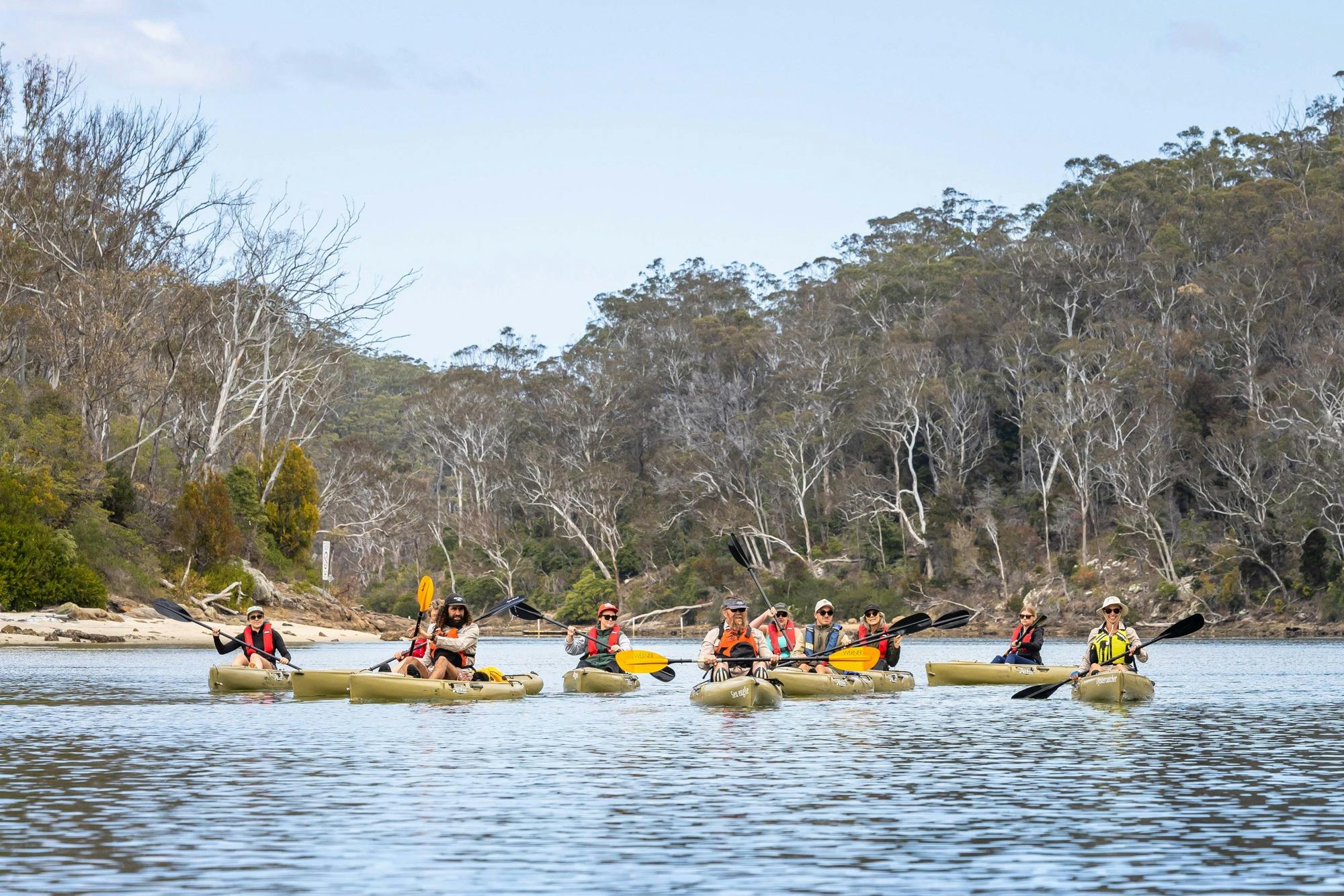 Guests kayaking Pambula River