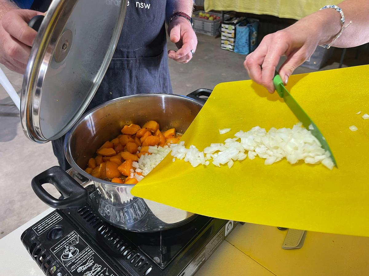 adding onion to the pot