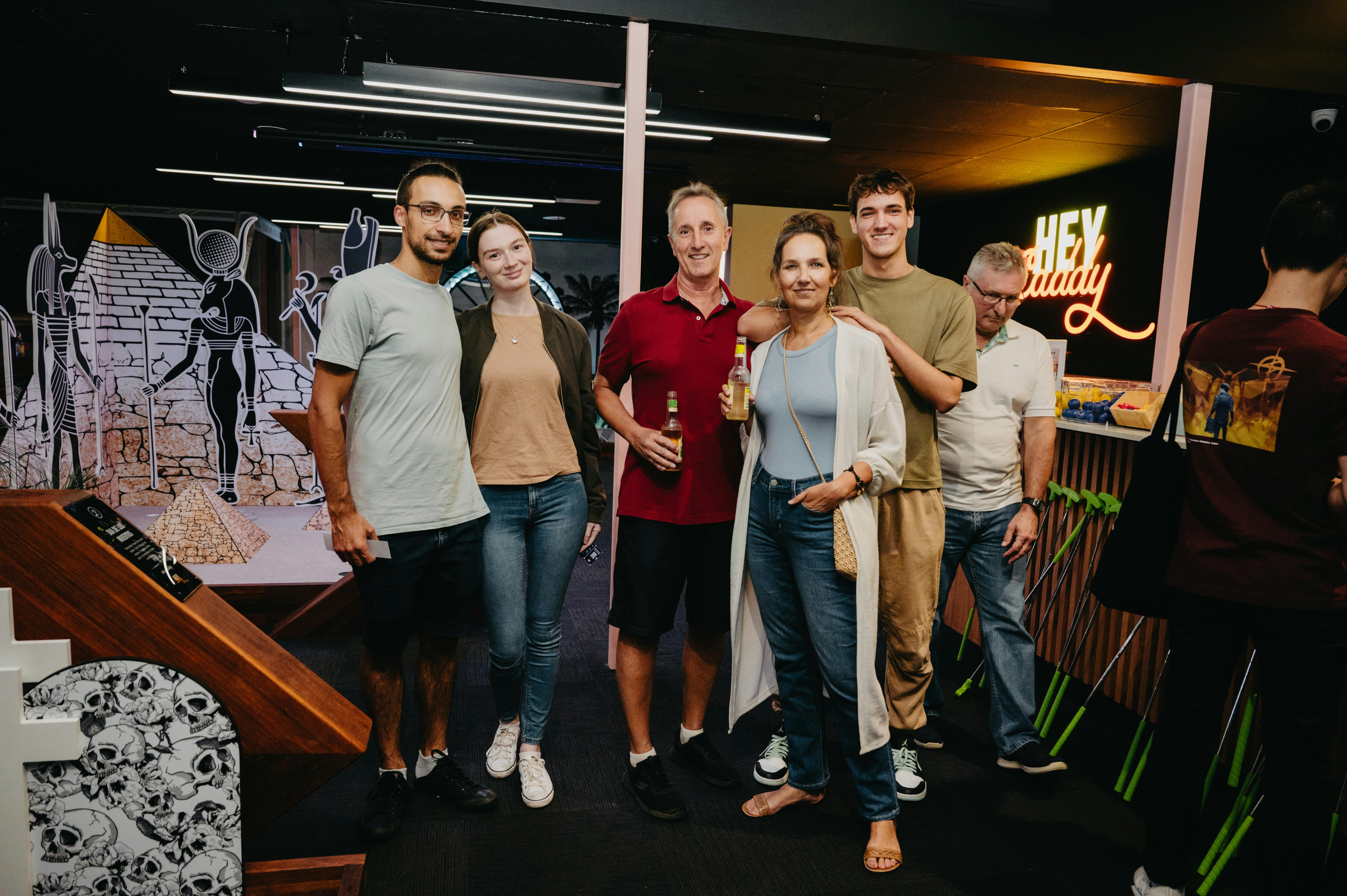 People smiling at the Hey Caddy Macarthur venue