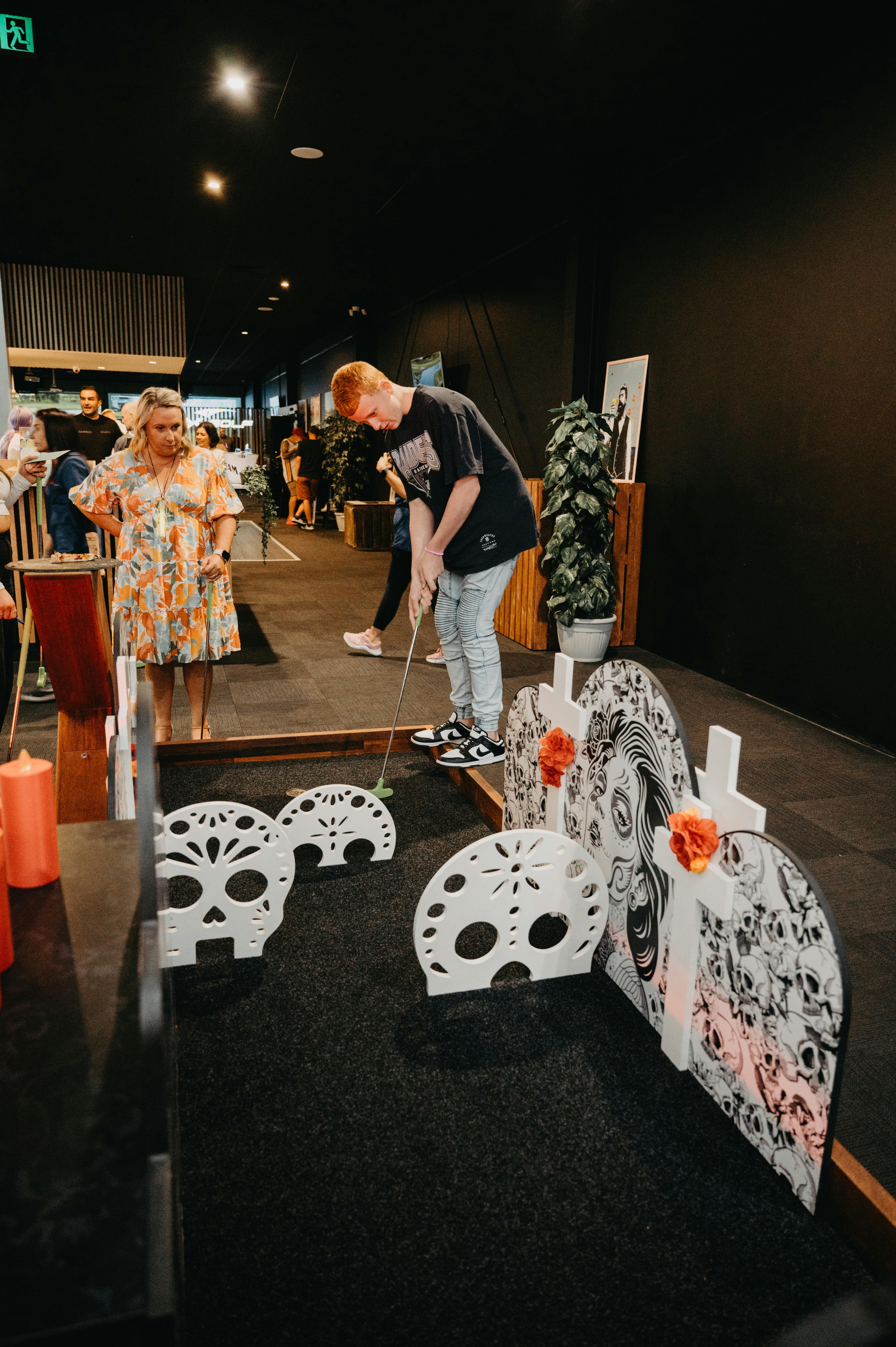 Guests playing Mini Golf