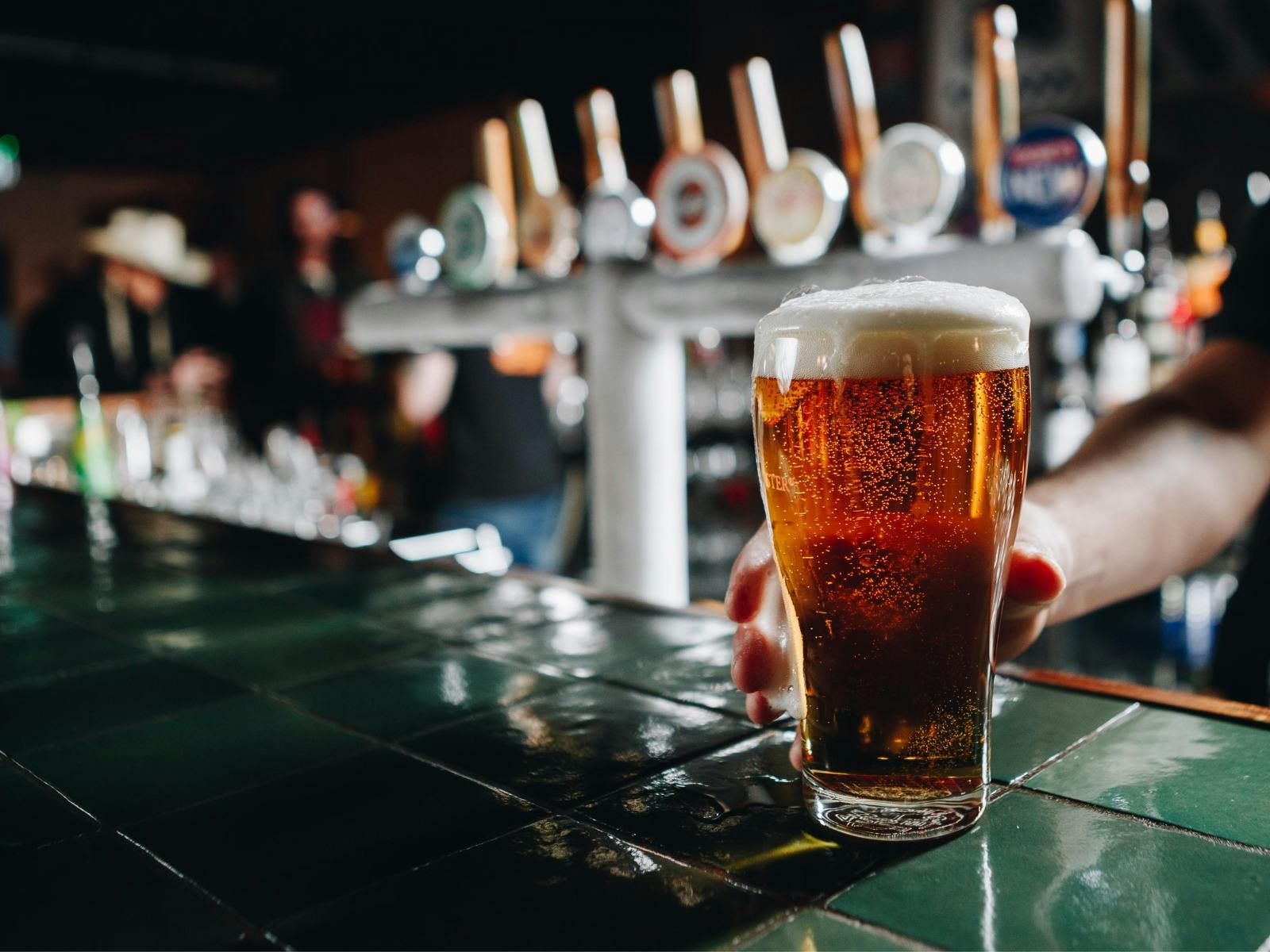 Freshly poured schooner at the bar.