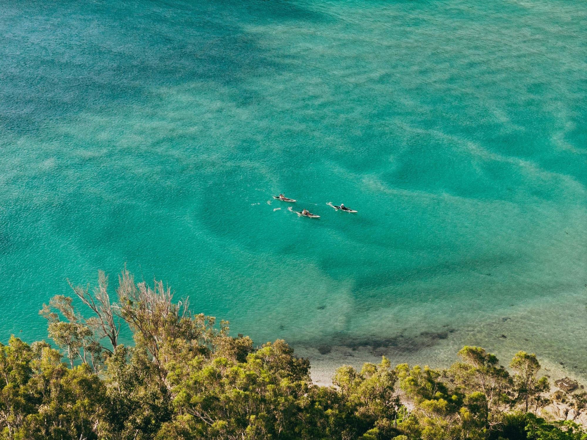 Aerial views of the crystal clear Pambula River.