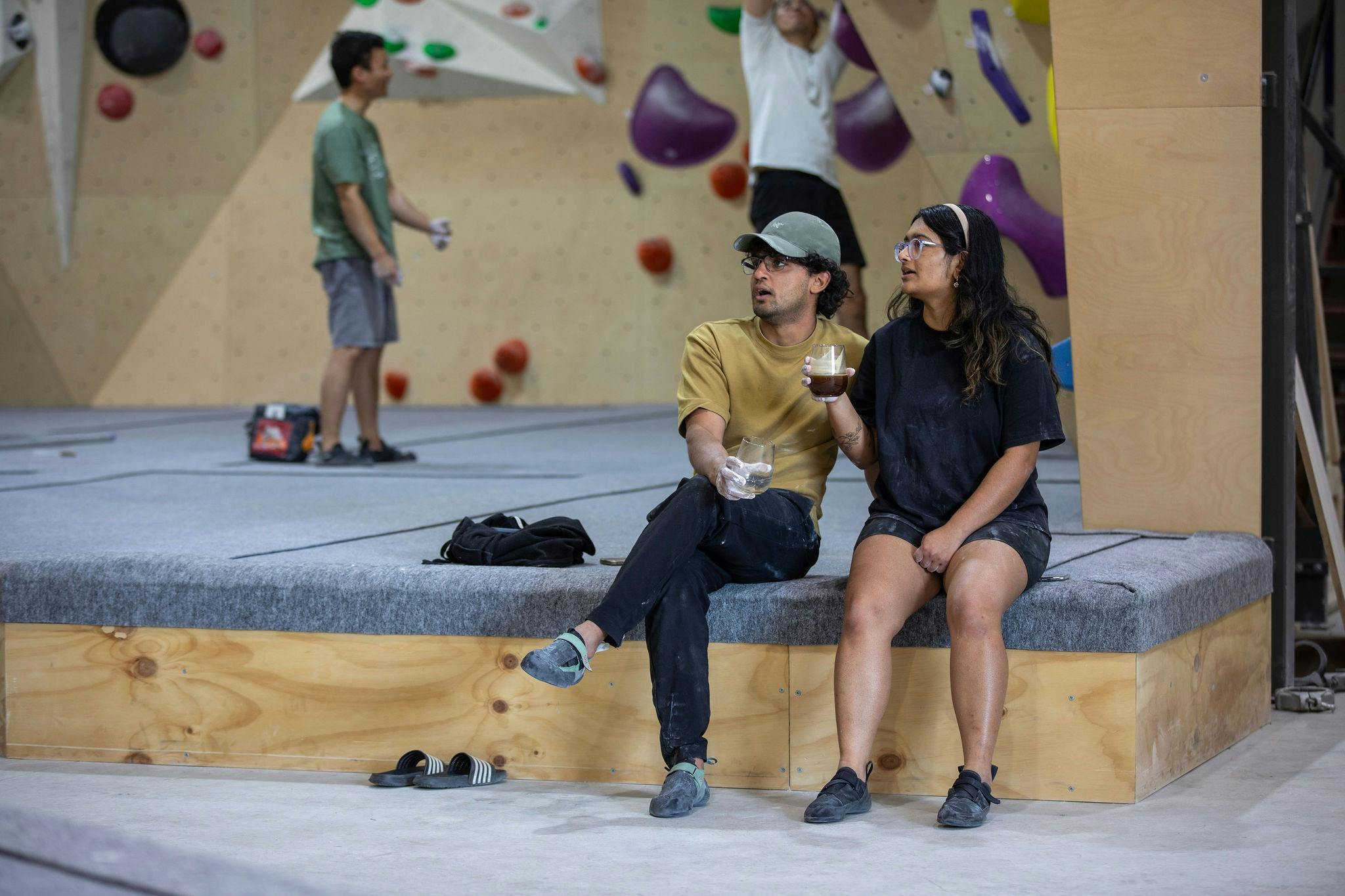 Two people watching on at Nomad Bouldering