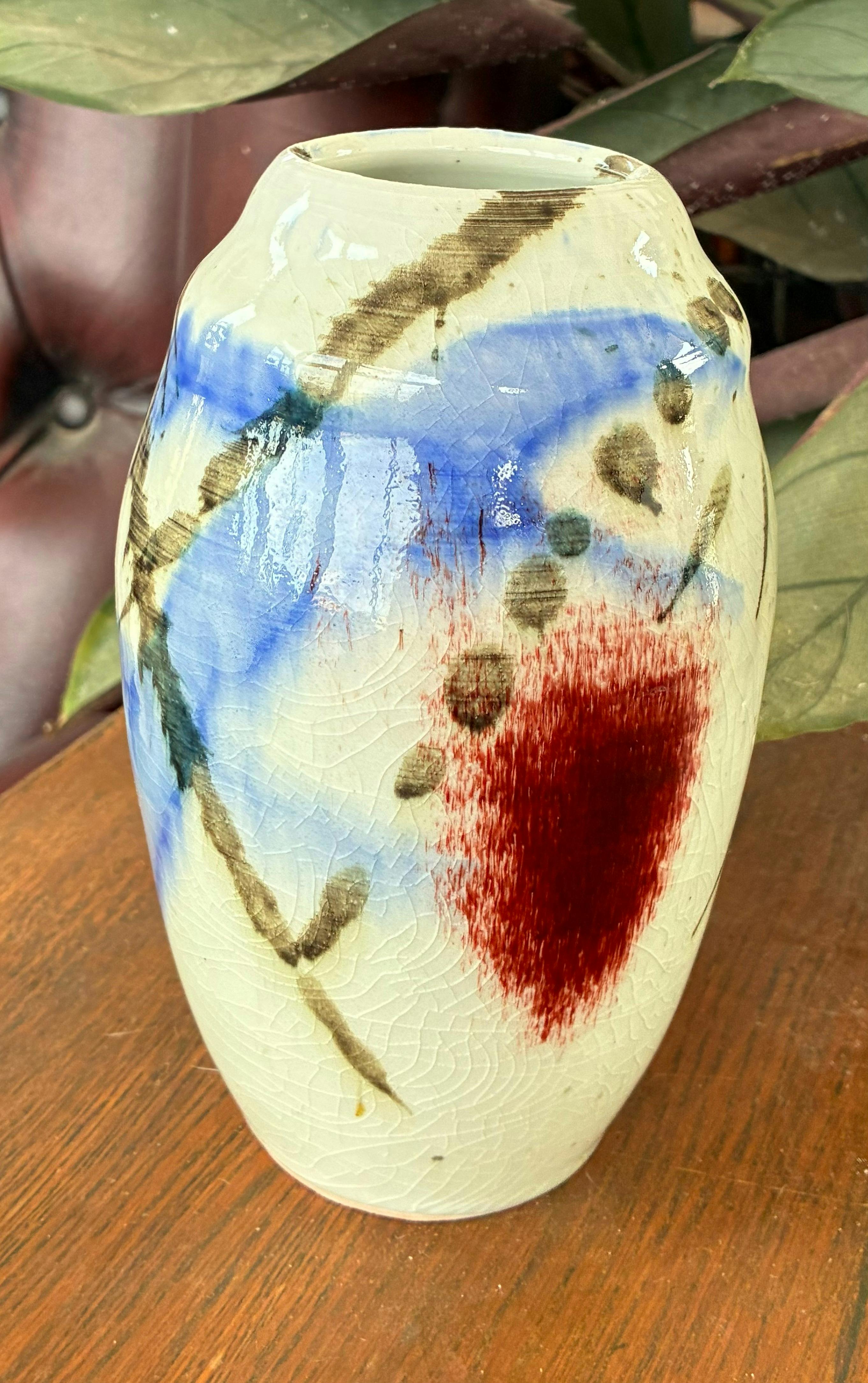 Vase with a splash of copper red, rich in character and artisan charm, by Louise Duncan