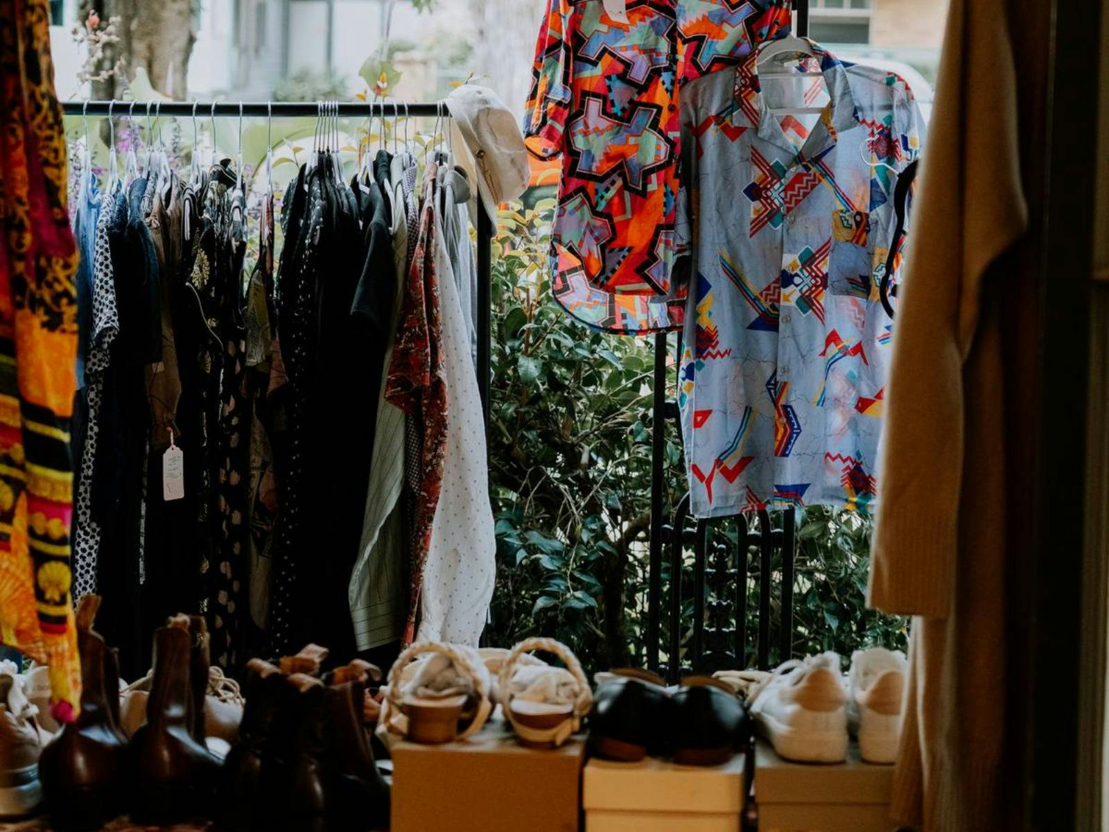 Sunshine and smiles all around, welcoming the thrift community.