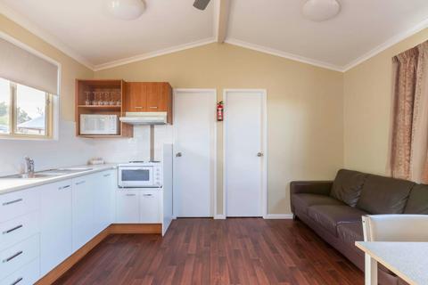 Deluxe cabin Kitchen and Lounge area