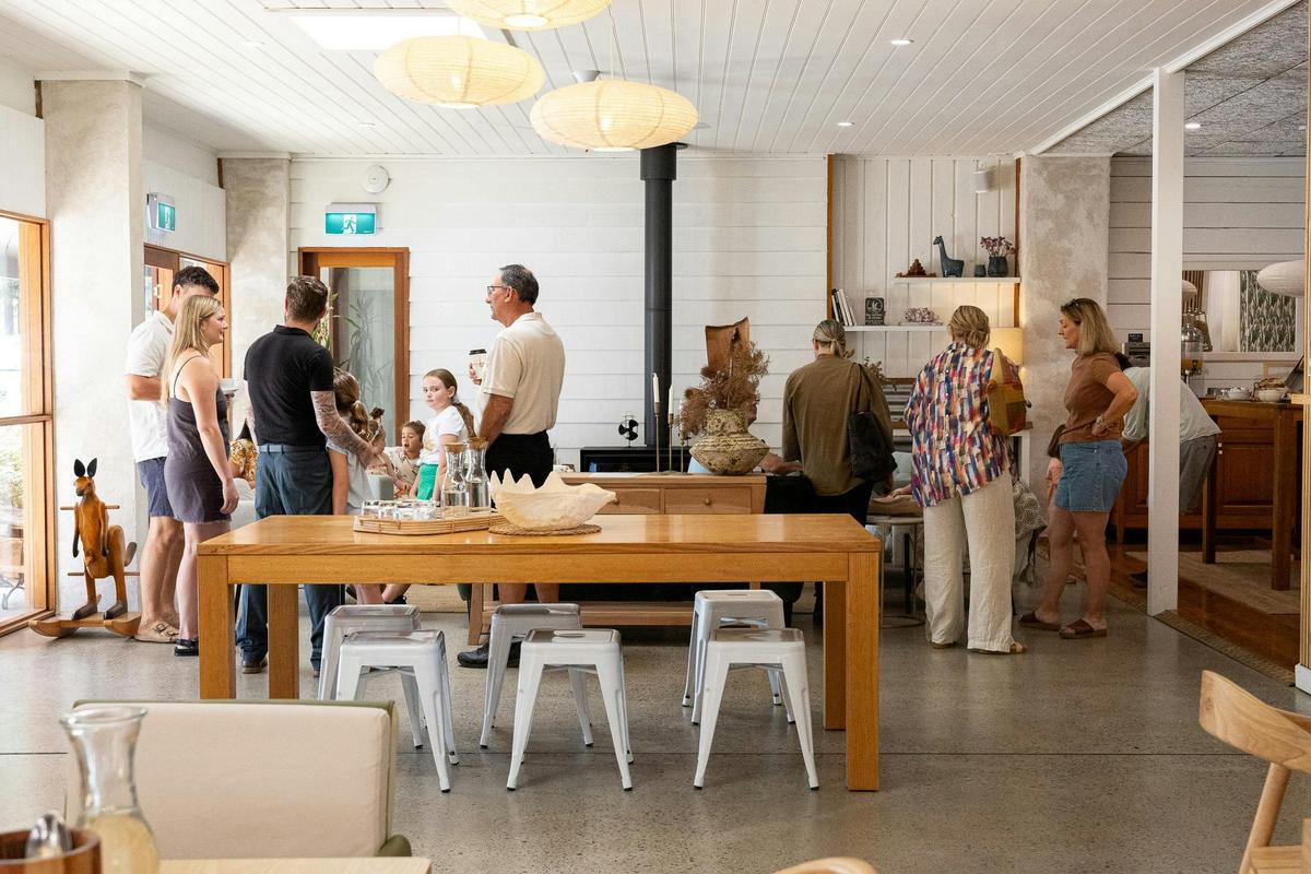 The Café Jervis Bay indoor fireplace and lounge area
