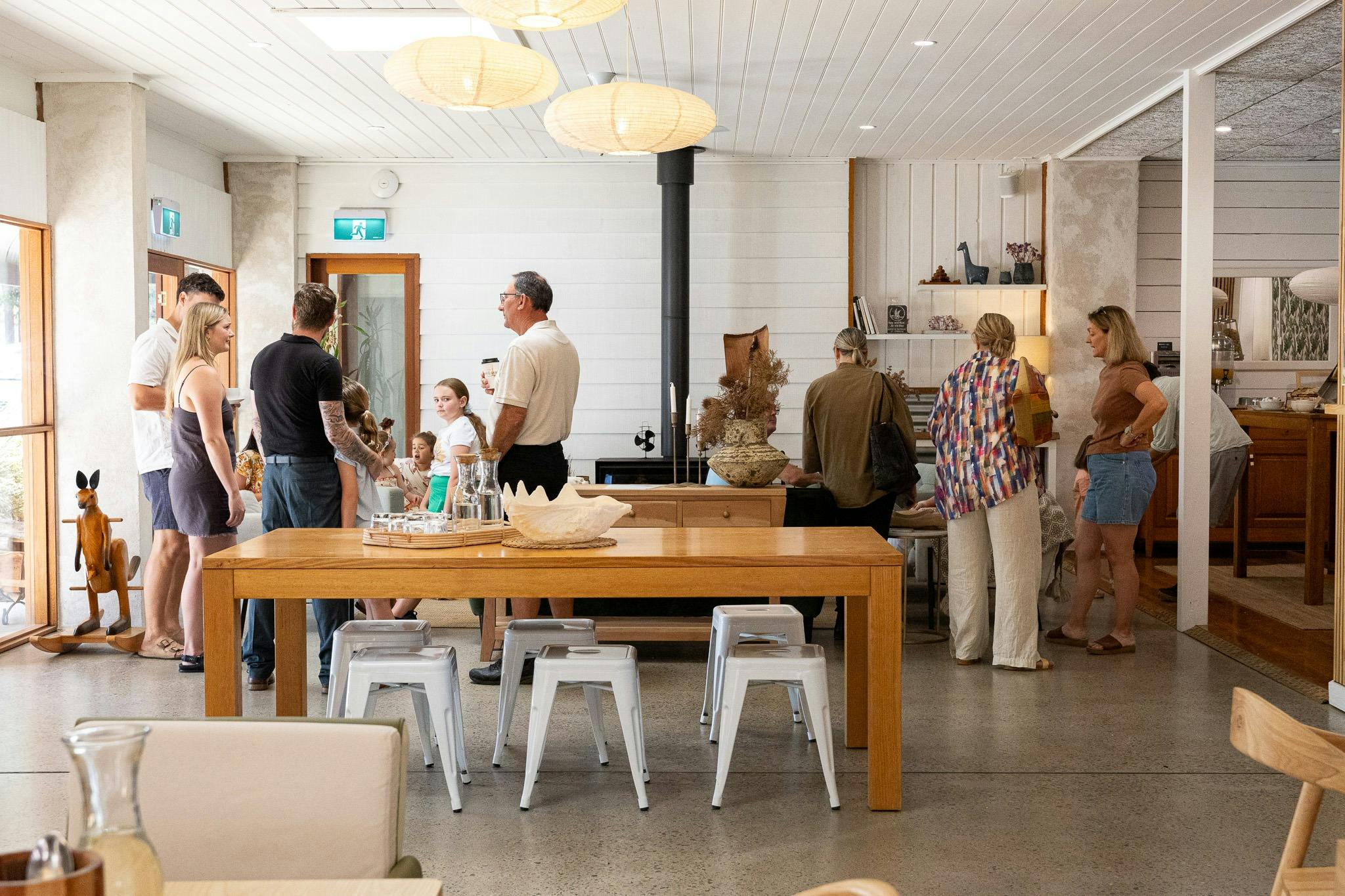 The Café Jervis Bay indoor fireplace and lounge area