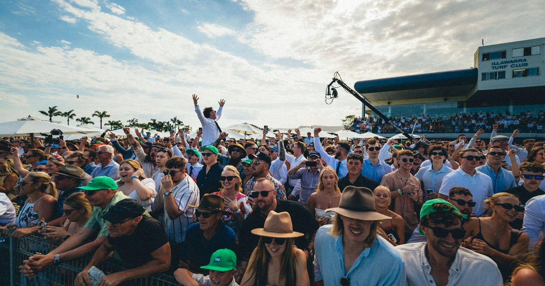 Racegoers celebrate at The Gong