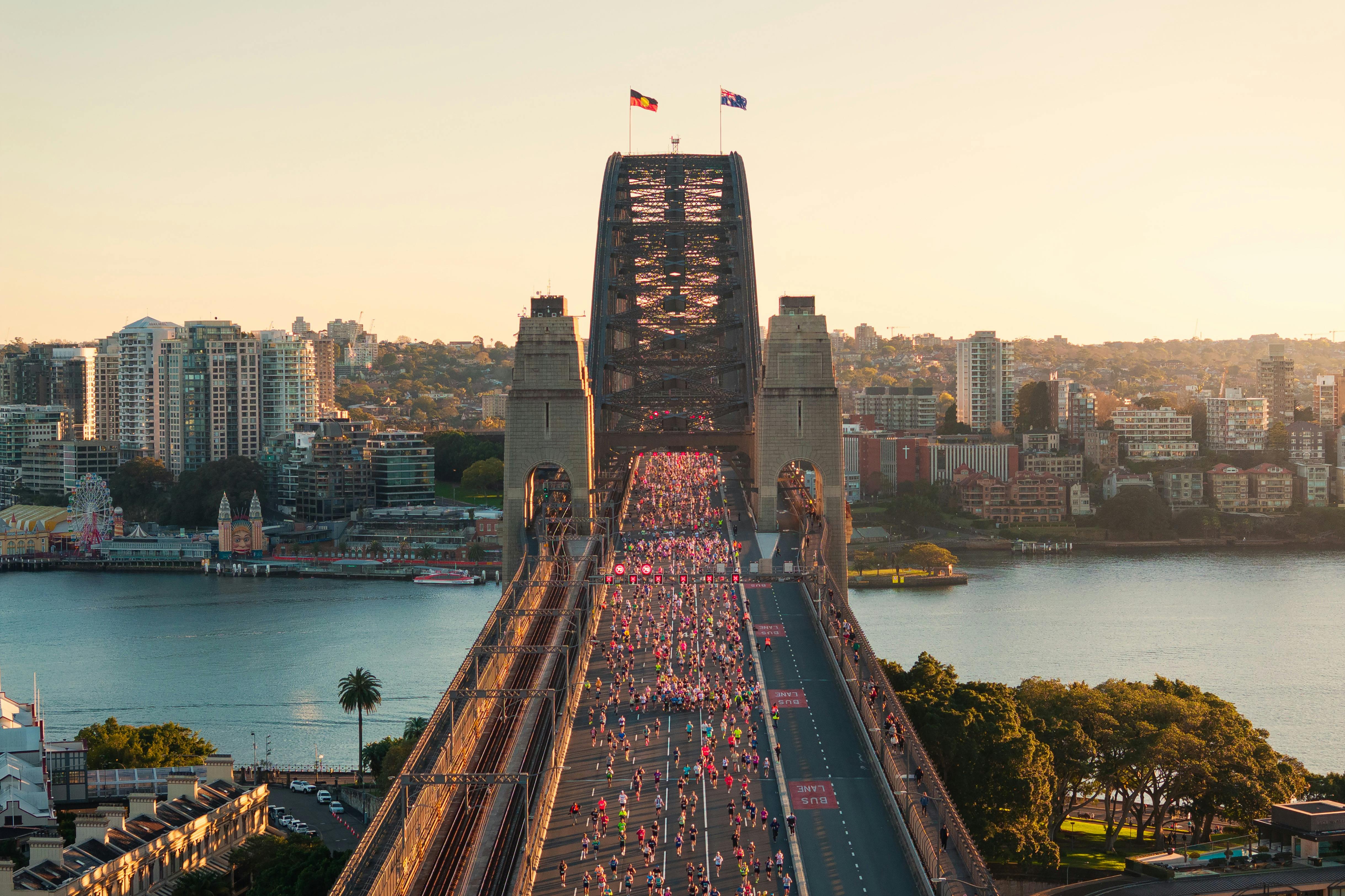 Sydney Harbour Bridge with tens of thousands of marathon runners running on the closed road
