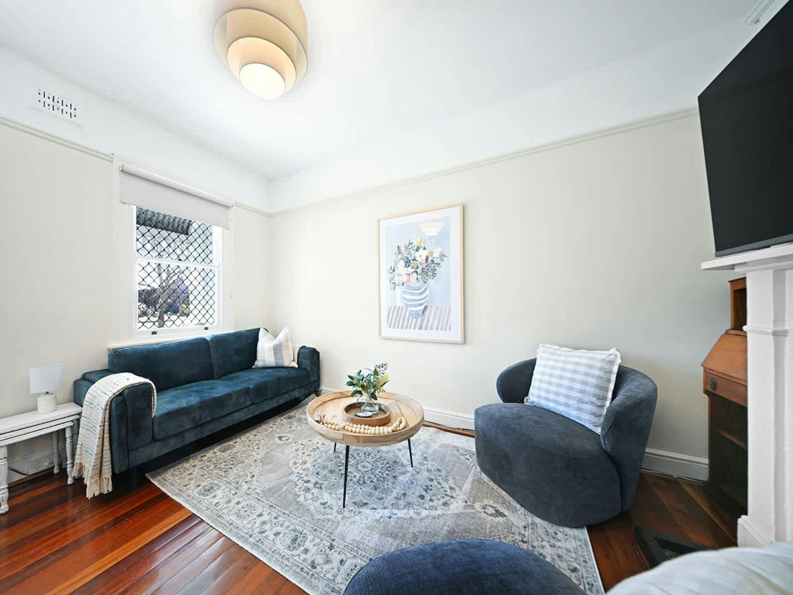 Loungeroom at Cosy March Cottage