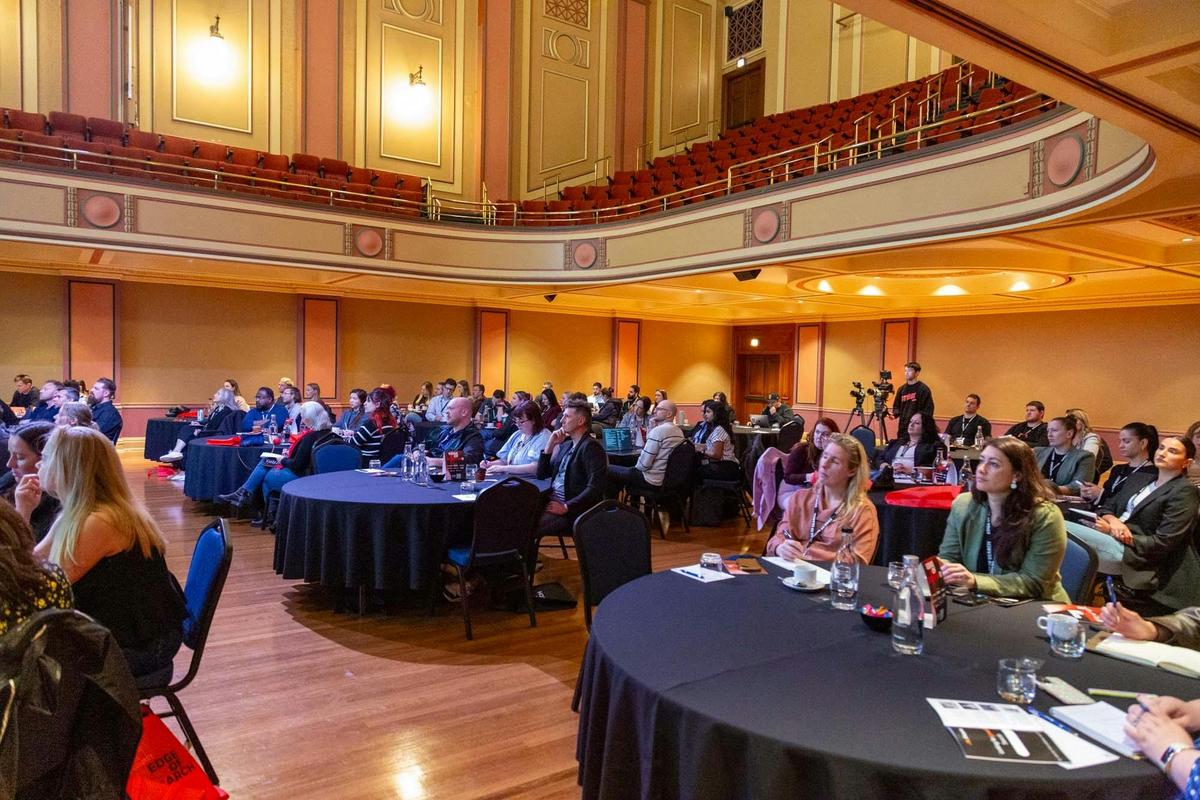 Audience at Edge of Search 2025 in the Newcastle City Hall ballroom.