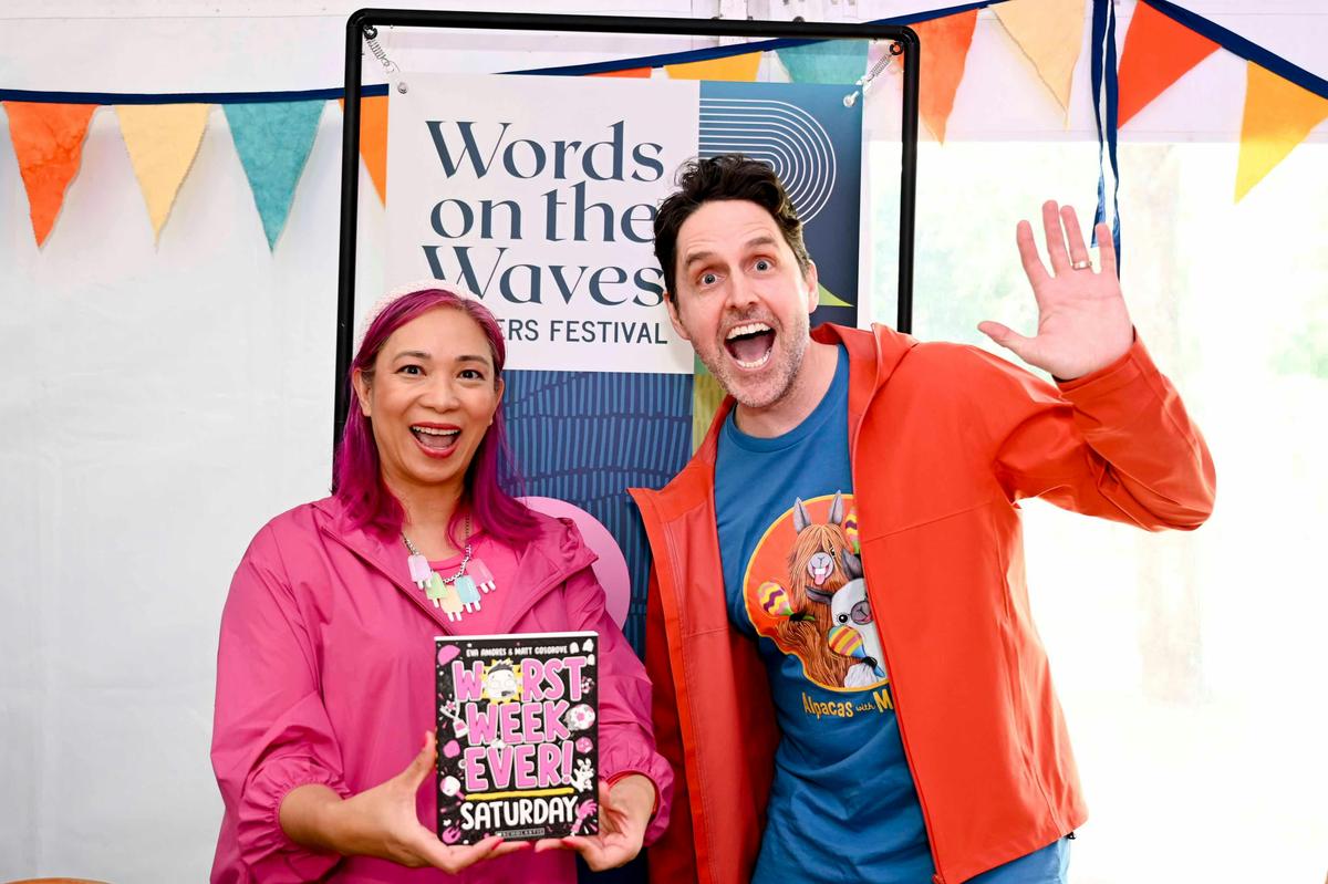 Macca the Alpaca author Matt Cosgrove with author Eva Amores at the free Family Fun Day