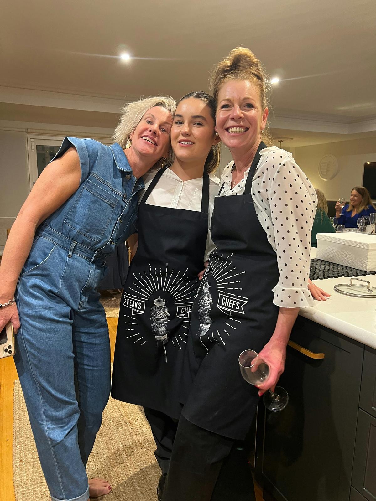 The front of house  team with a happy client