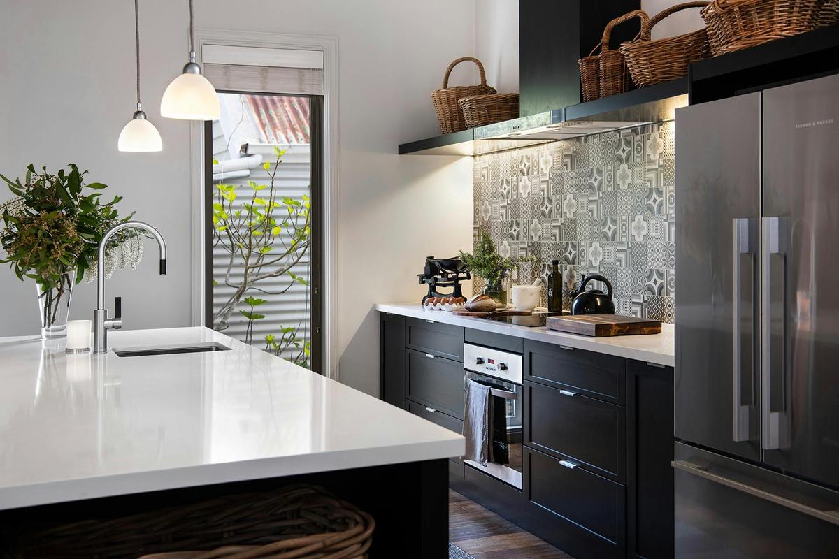 Everything you need for a night in can be found in this beautifully appointed kitchen