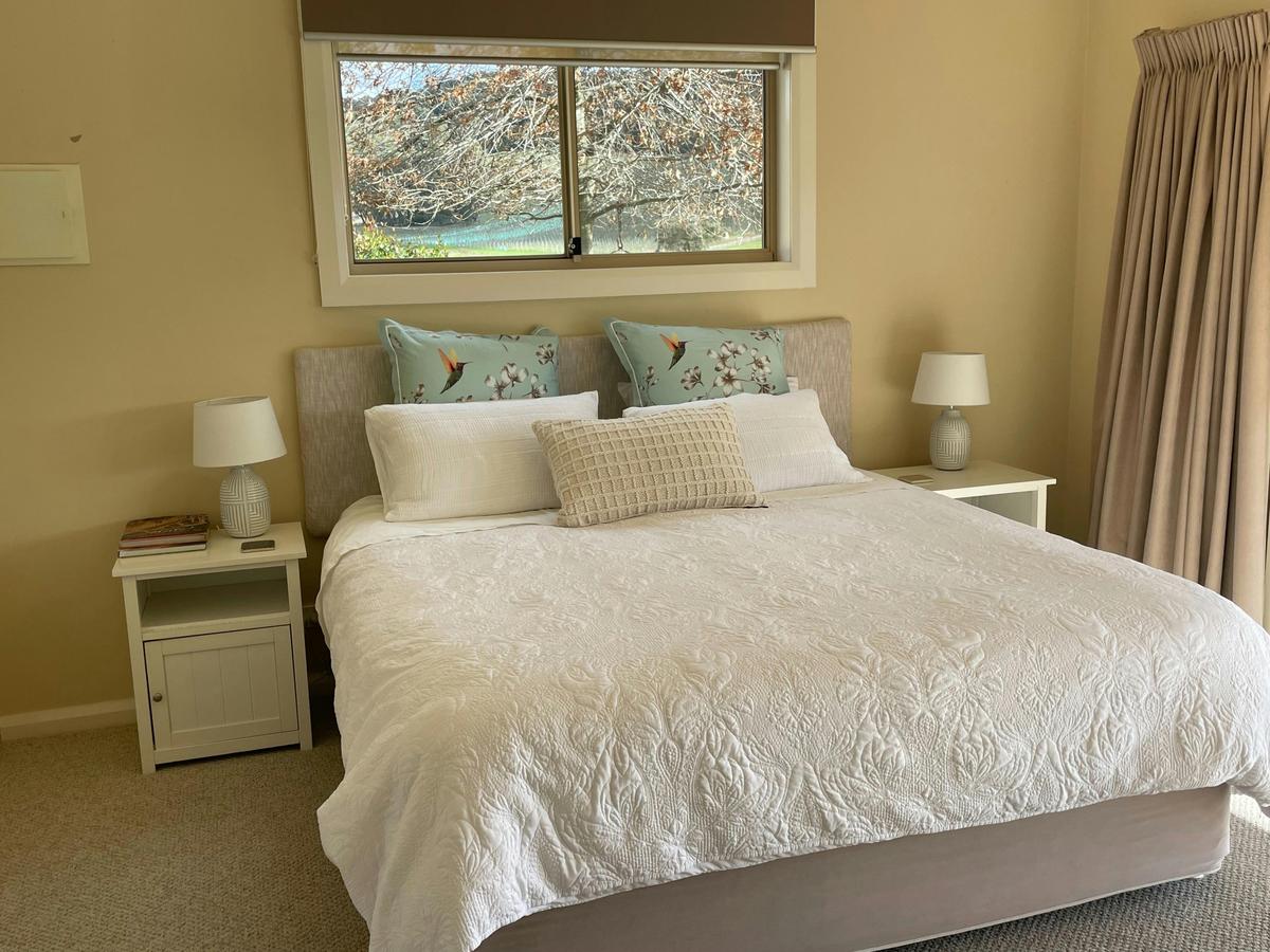 King Bed ready for slow mornings and take in the landscape and happenings without getting out from u