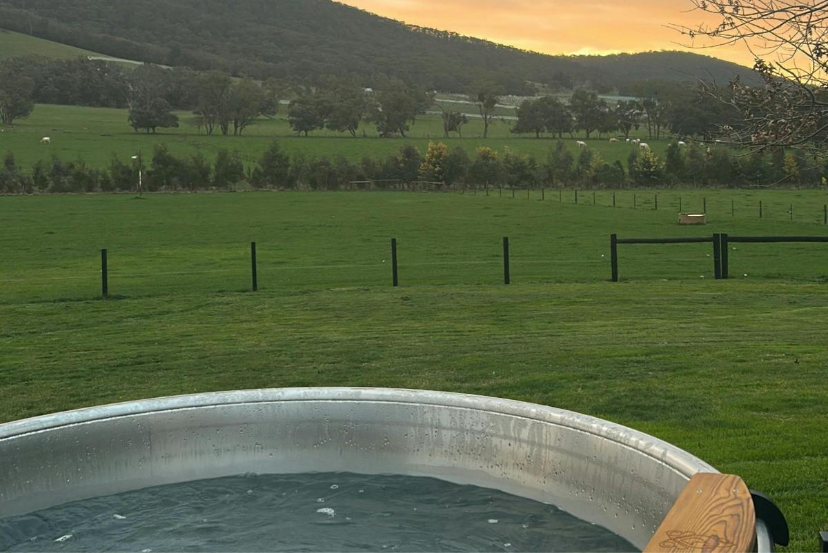 Sunset never felt so good-grab a glass and soak away your worries.