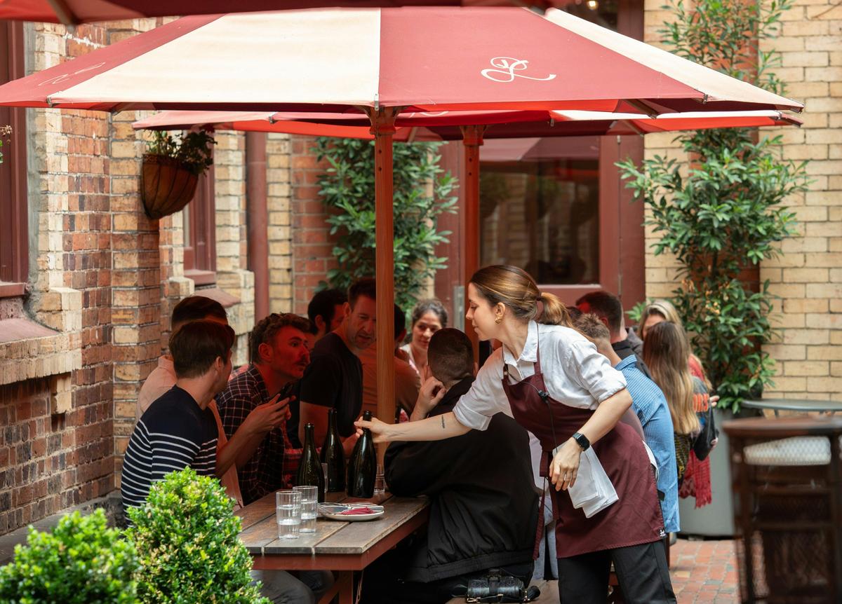 Group of people dining outdoors at Pepe's