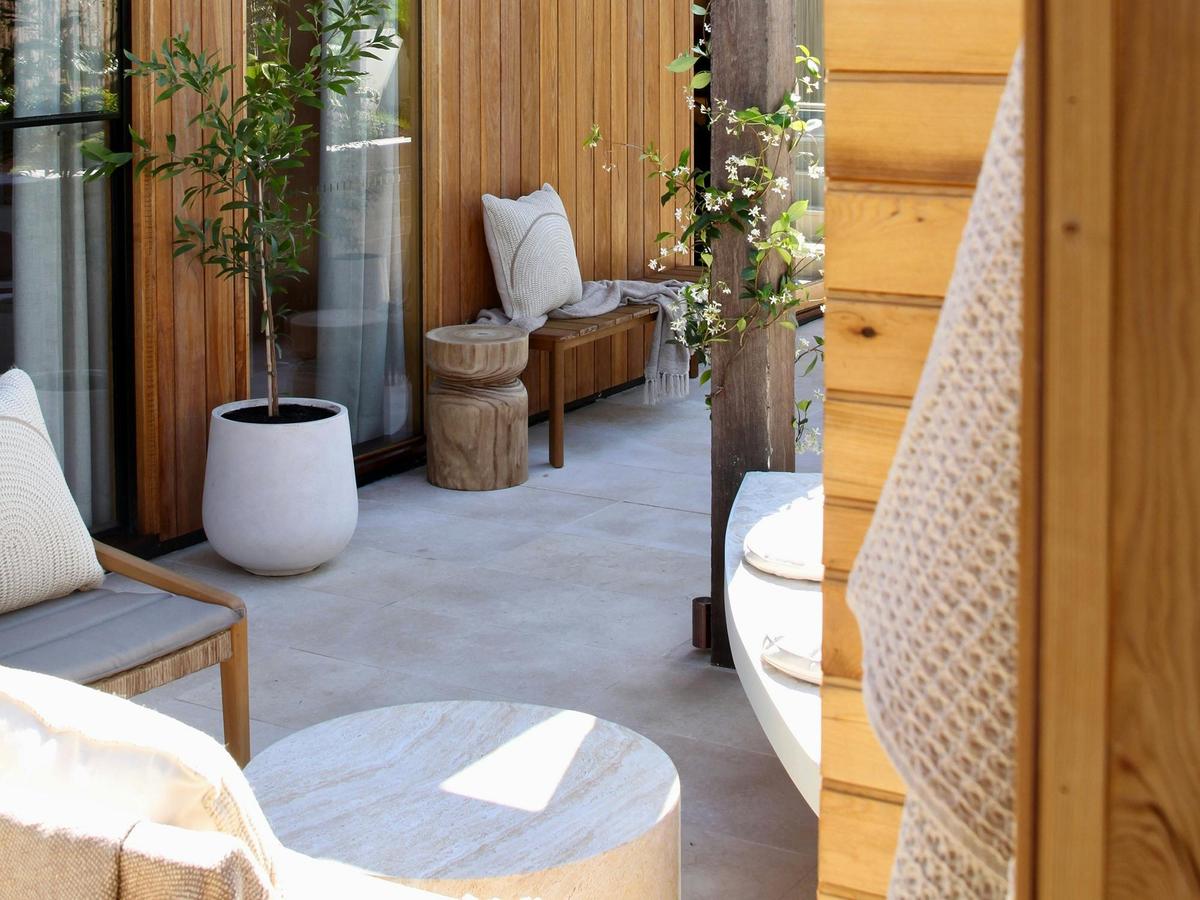 Courtyard space for relaxation between treatments at Flo Alchemy, San Remo