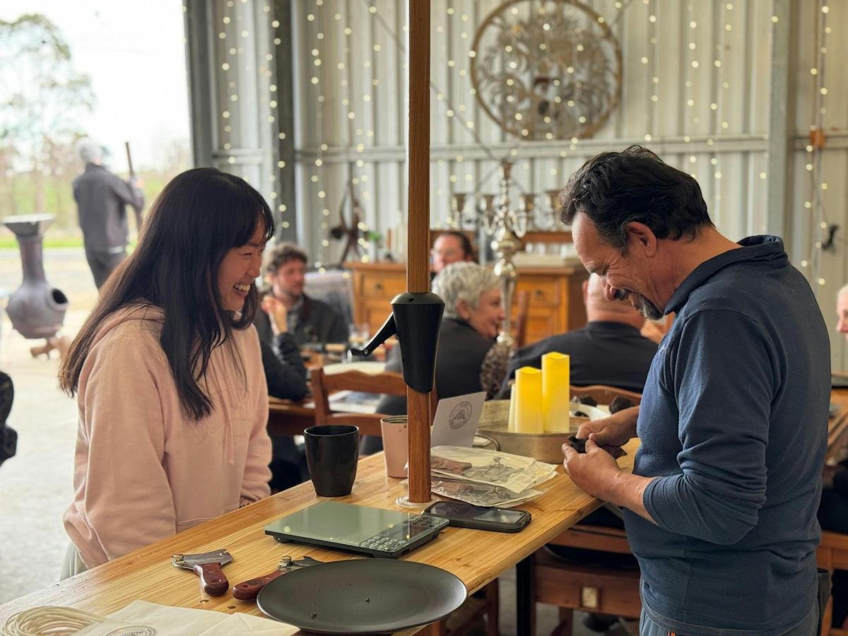 Guest enjoying the experience and aroma of buying a fresh truffle at Scotch Hill Truffle Farm