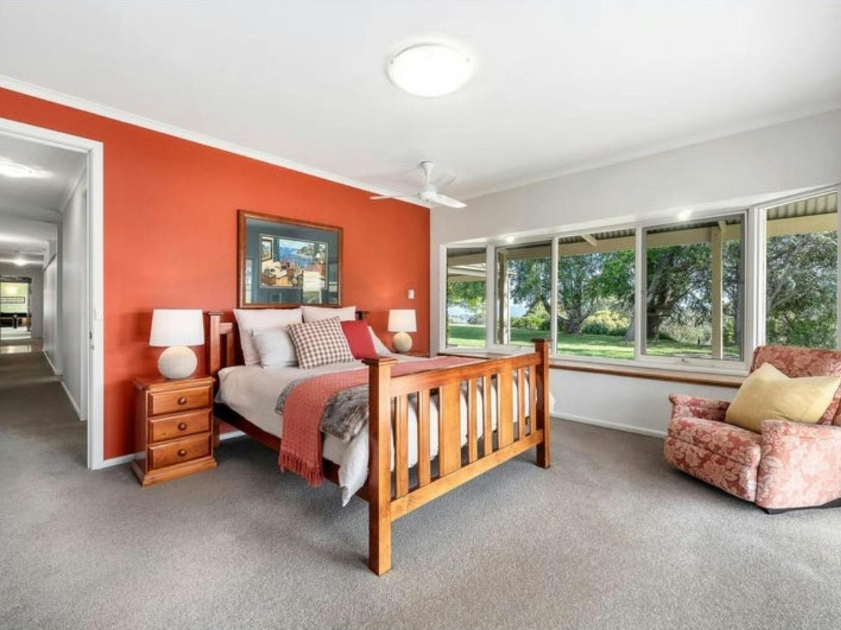 One of the 5 bedrooms at Sambar Ridge farm stay offering comfort in a peaceful rural setting.