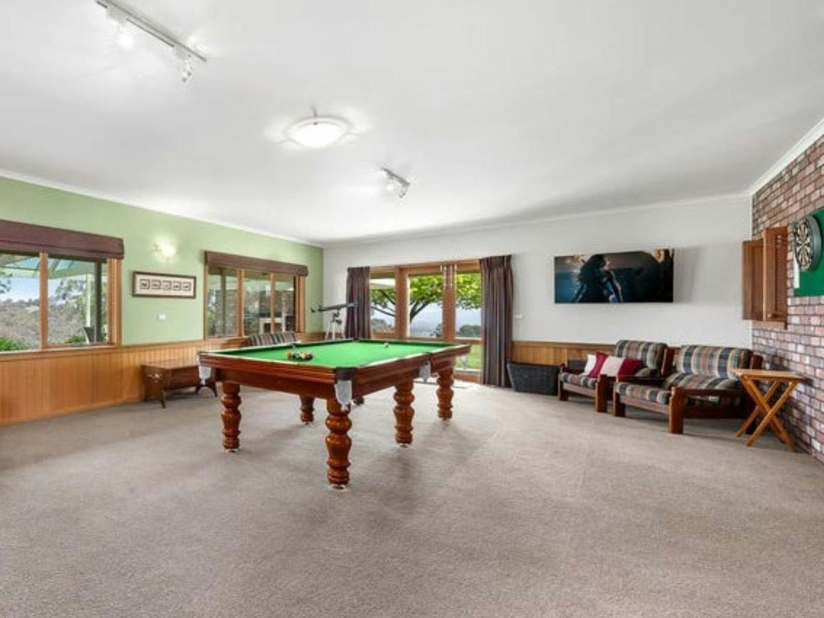 Game room at Sambar Ridge farm stay offering space to relax and enjoy indoor activities.