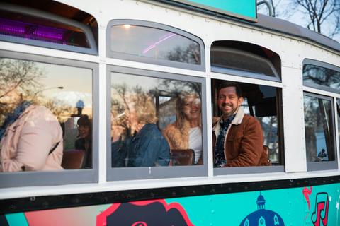 Passengers onboard the Groove Tram