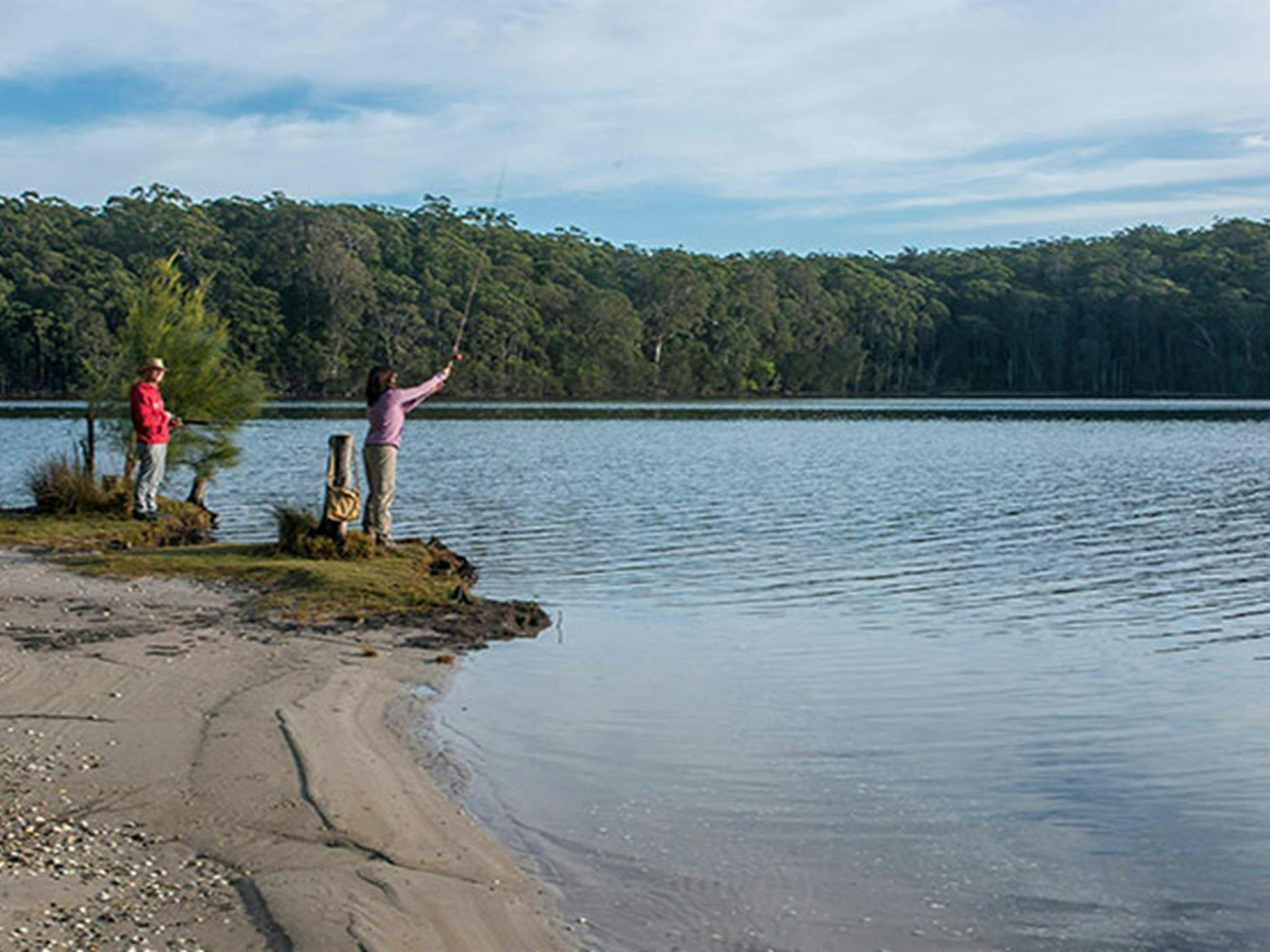 Couple fishing on Burrill Lake, Giriwa walking track, Meroo National Park. Photo: Michael Van Ewijk