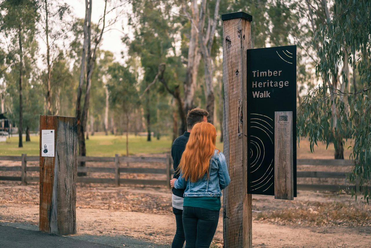 Couple walking the Timber heritage Walk