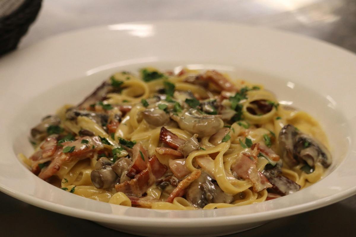 Creamy pasta with mushrooms and crispy bacon, tossed in a rich sauce and finished with fresh herbs.