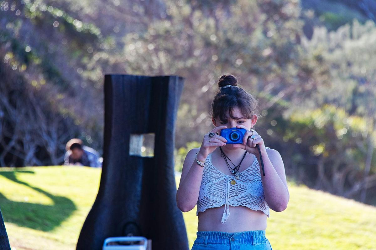 Mindful Photography Session guest taking a photograph while being photographed