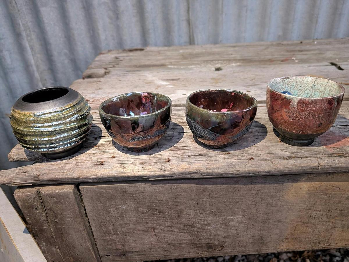 Variuos finished glazed raku pots