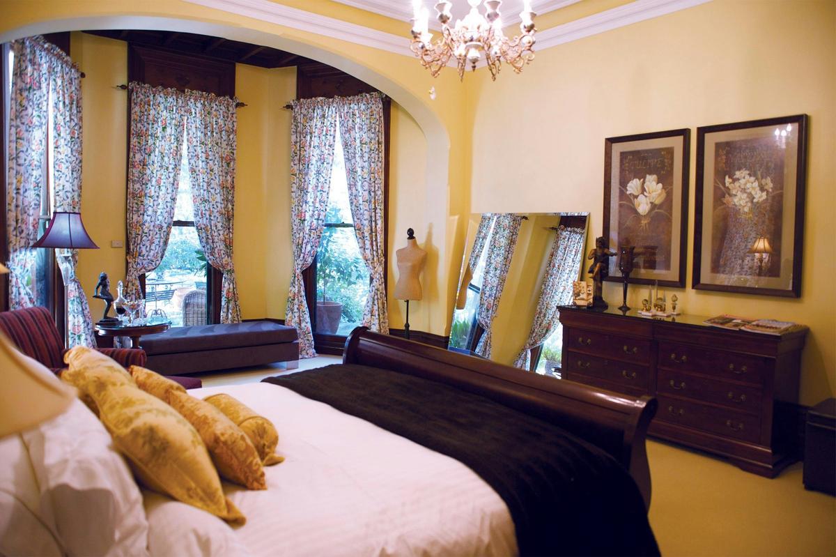 The grand Botannica Room overlooking the parkland gardens, super King bed dressed with superb linen